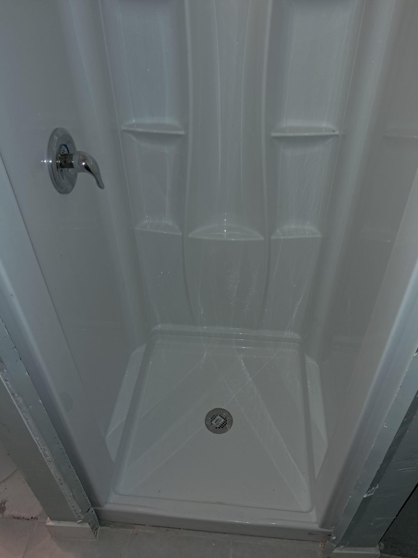 Clogged drain with acid dissolving blockage, a common issue addressed by floor drain manufacturers and commercial drain replacement services.