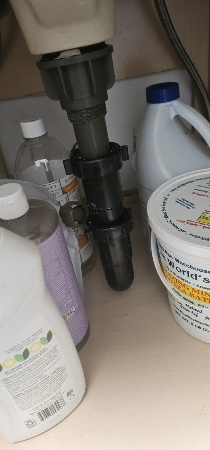 Image depicting commercial drain cleaning services, including unblocking drains and using commercial-grade drain cleaner to maintain clear and efficient plumbing systems.