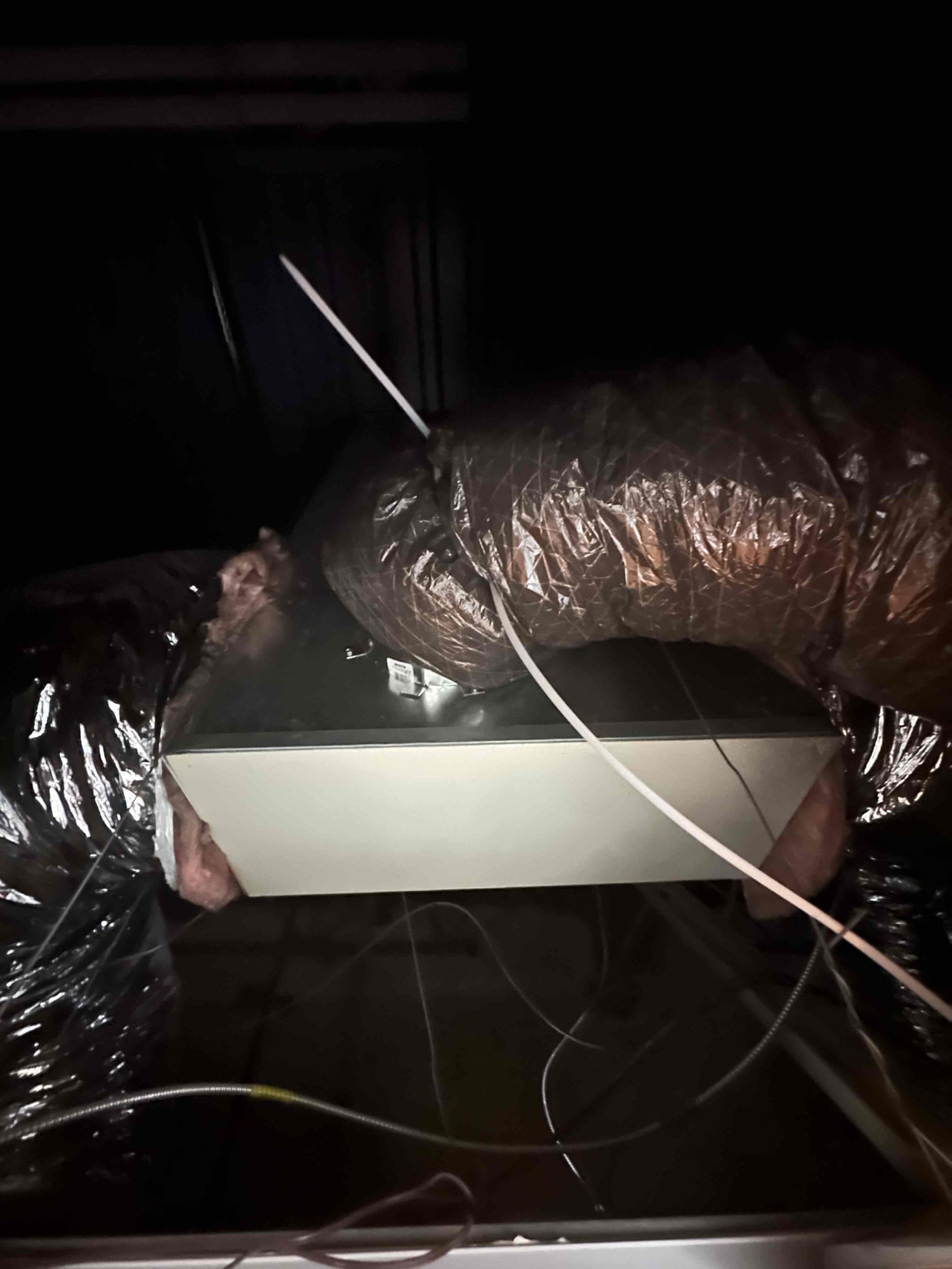 A through-the-wall air conditioning unit, often a 110v AC model, installed in a residential setting, providing efficient cooling. This installation offers a practical air conditioning solution for homes.