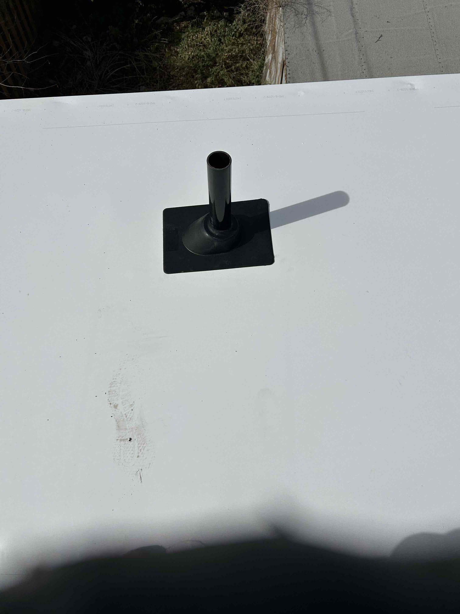 Image depicting commercial sewage backup remediation troubleshooting, highlighting the importance of a properly functioning commercial backflow preventer. Shows a technician inspecting plumbing, emphasizing professional commercial sewage backup remediation service to prevent contamination and property damage.