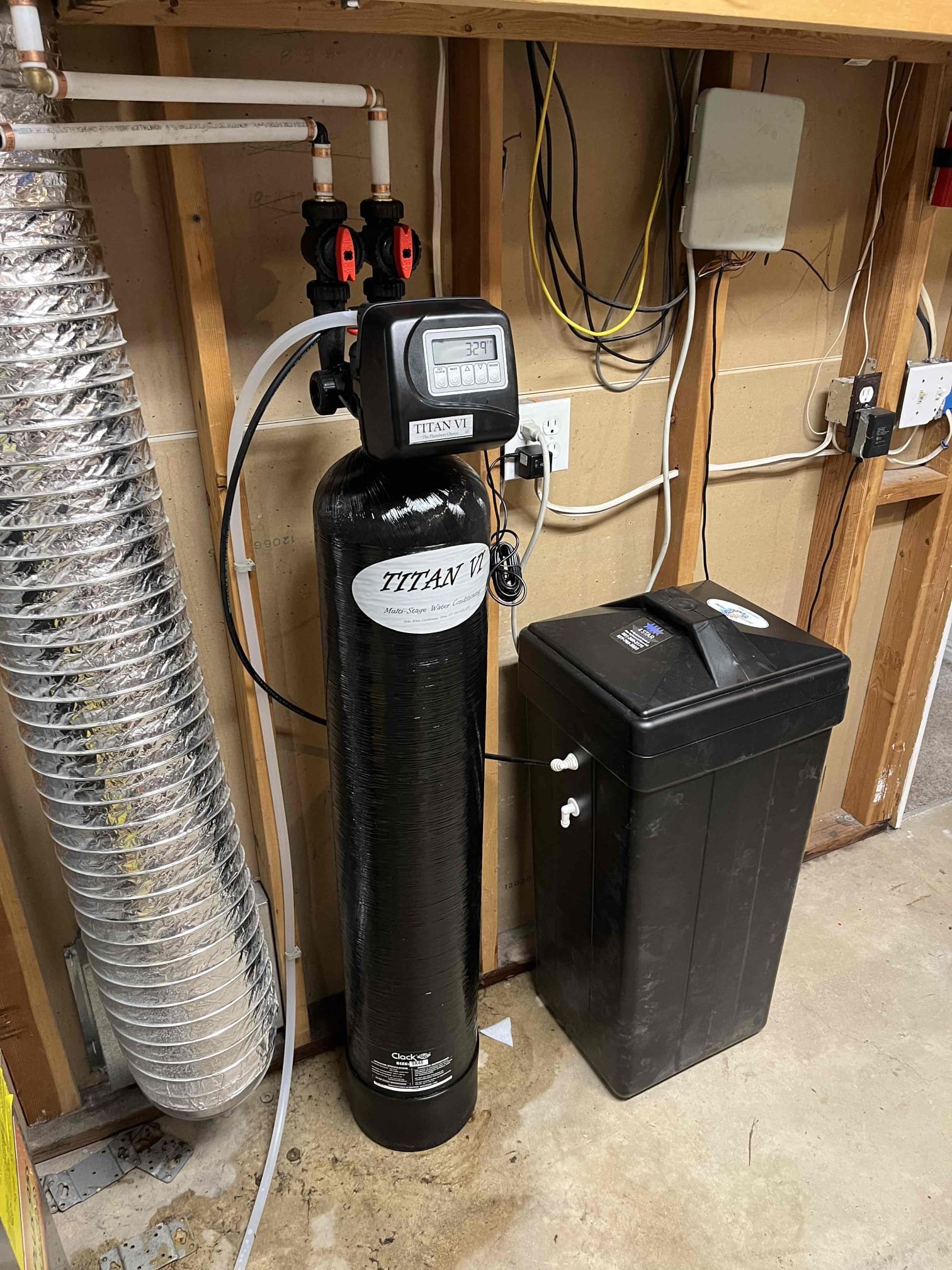 Frustrated homeowner staring at a cold shower, highlighting the need for 'water heater replacement near me'. Consider a cost-effective solution: 'tankless water heater installation cost' for endless hot water.