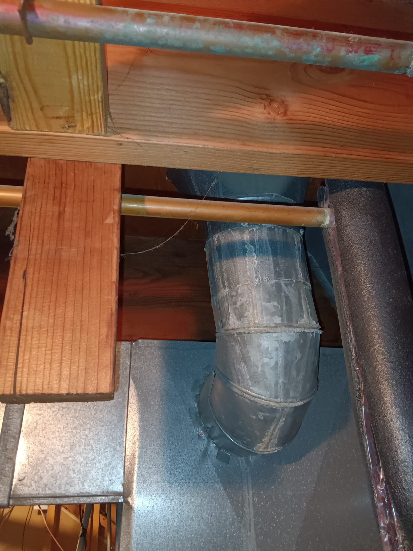 Residential drywall showing water damage, potentially causing unpleasant odors. Inspection focuses on identifying the source, such as a hot water tank issue ('why does my hot water stink?'), and implementing affordable odor removal solutions after water damage remediation.