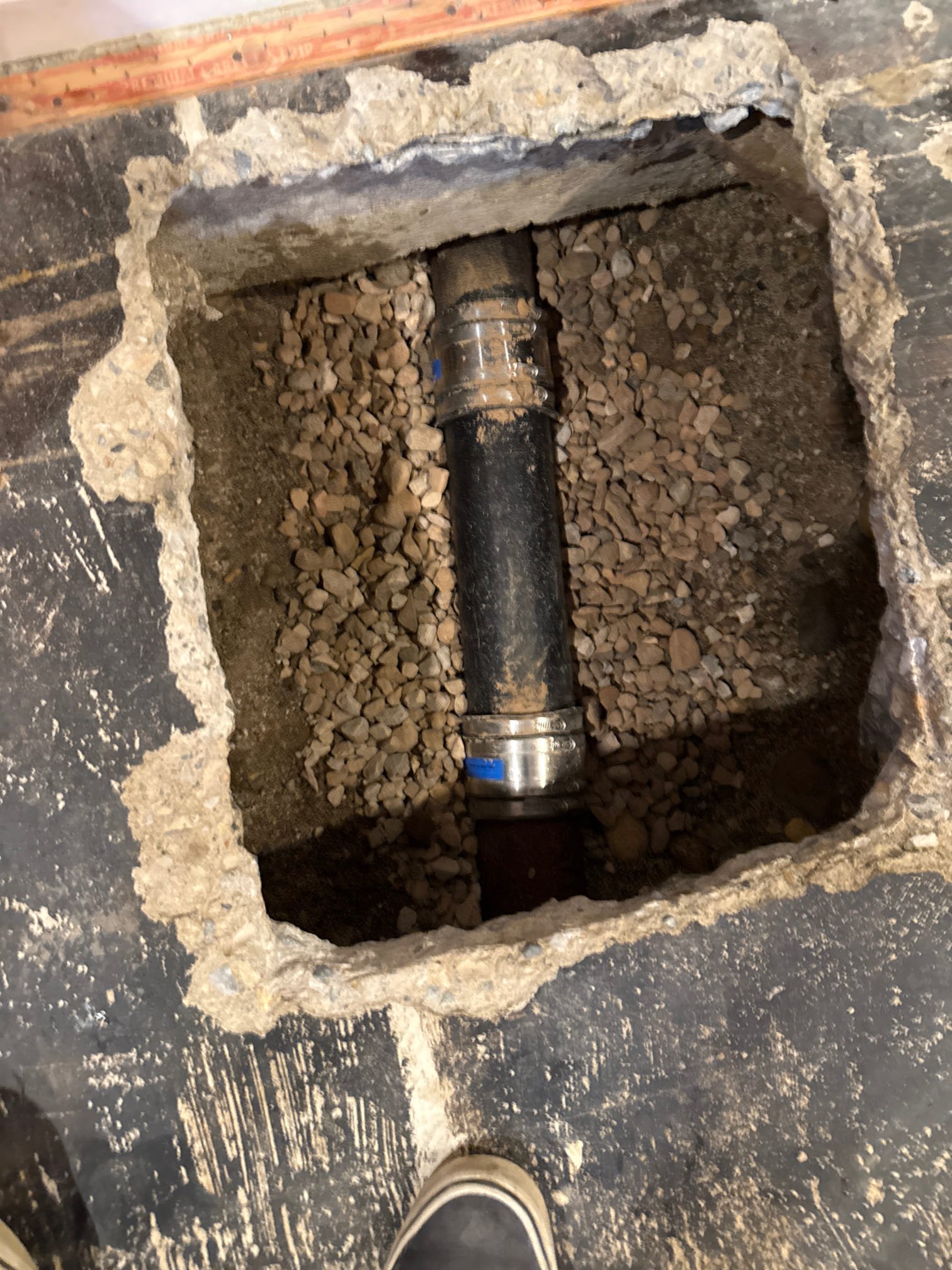 Image depicting signs you need sewage backup recovery, possibly showing sewage overflow in a backyard. Emphasizes the importance of sewage backup recovery maintenance to prevent property damage and health hazards.