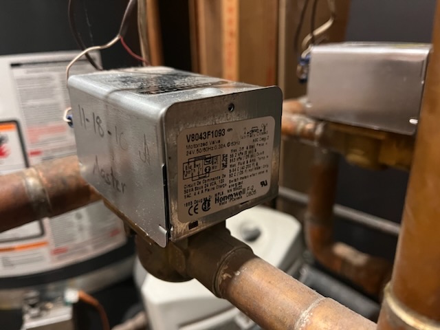 Modern tankless combi boiler, a space-saving and efficient alternative to traditional oil and gas boilers. Consider a tankless combi boiler during your next oil boiler filter replacement or gas boiler replacement for improved performance and energy savings.