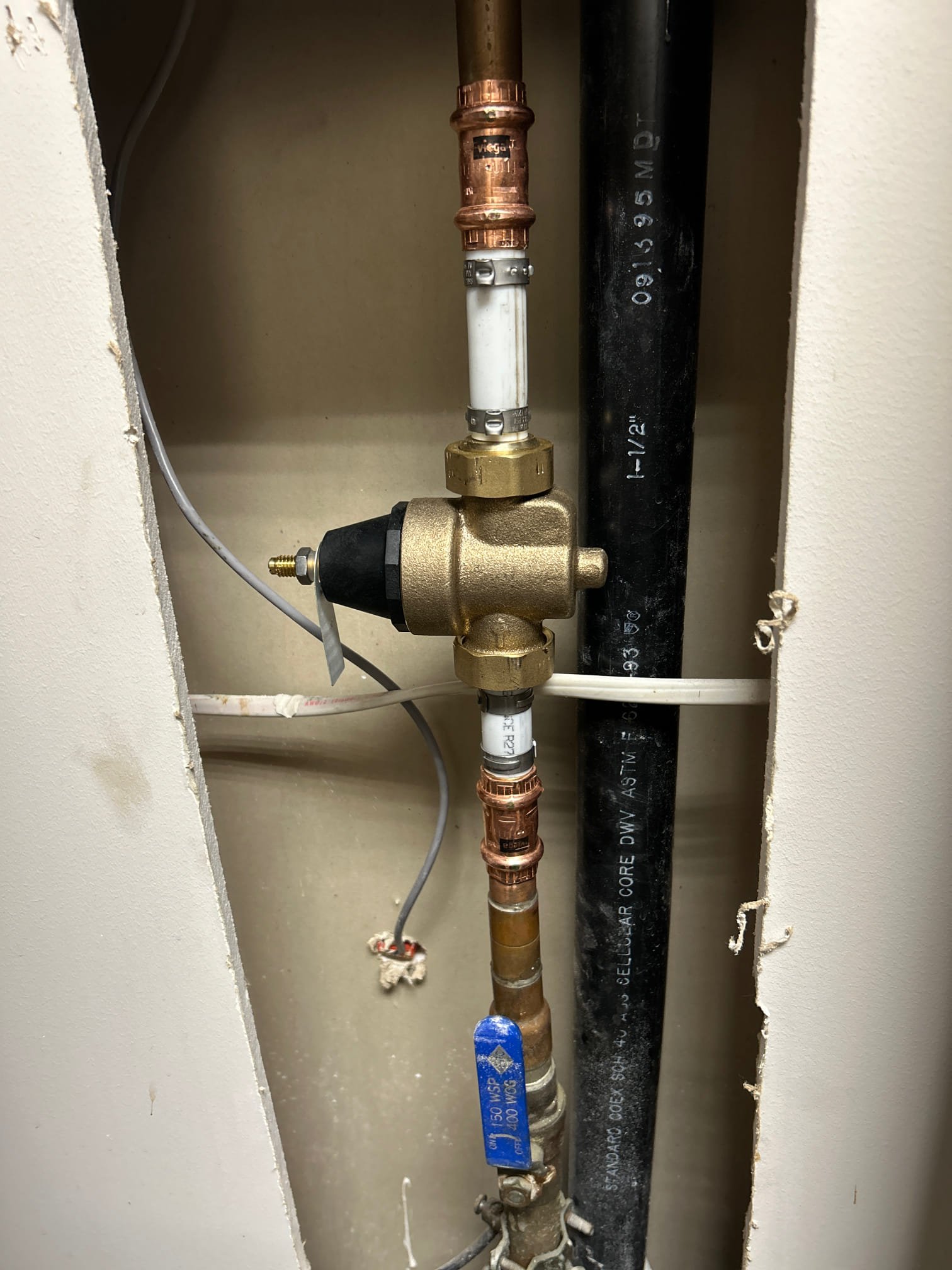 Image depicting commercial plumbing services, possibly showing pipes or plumbing equipment, with a subtle visual reference to commercial AC units, hinting at services related to 'AC for commercial' and 'A/C repair companies near me'. Ideal for businesses seeking local HVAC and plumbing expertise.