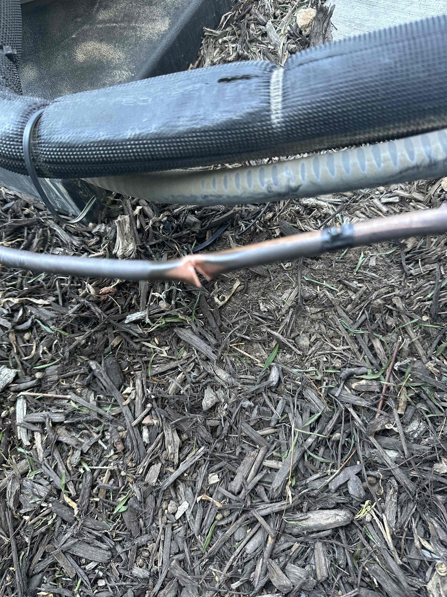 Mobile home HVAC system, possibly needing recharge or residential AC replacement service. Focus on efficient cooling and heating solutions for manufactured homes.