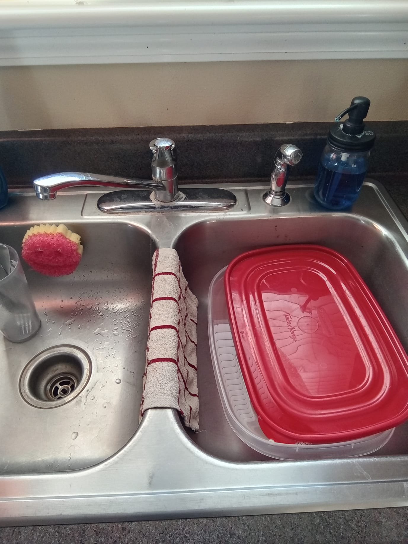 Diagnosing disaster restoration needs, including plumbing issues like resetting a sink disposal, to accurately assess disaster restoration pricing and overall recovery costs.