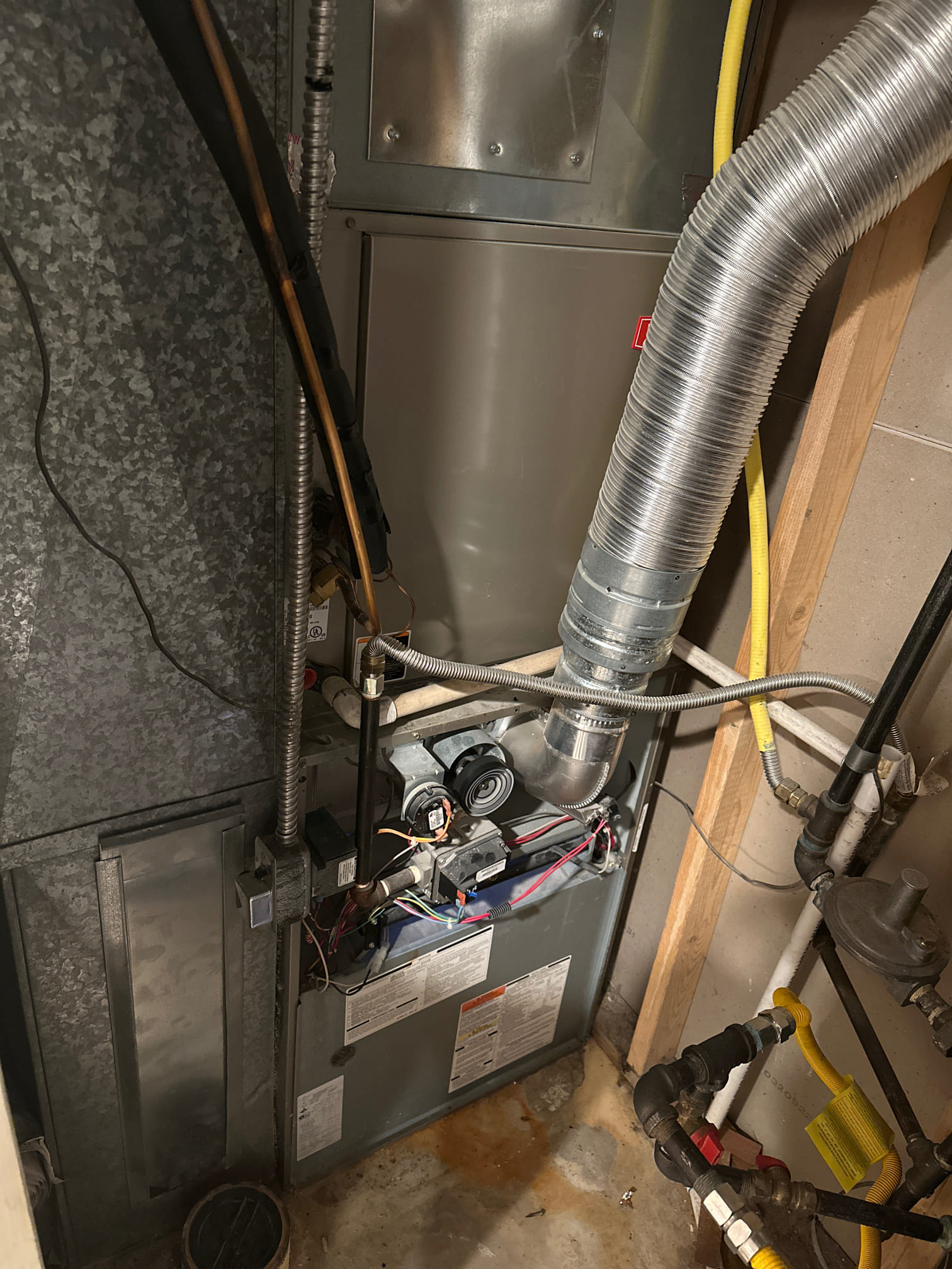 Ceiling furnace not igniting? This image relates to common furnace problems and the potential furnace replacement cost associated with a malfunctioning or broken down ceiling-mounted furnace system.