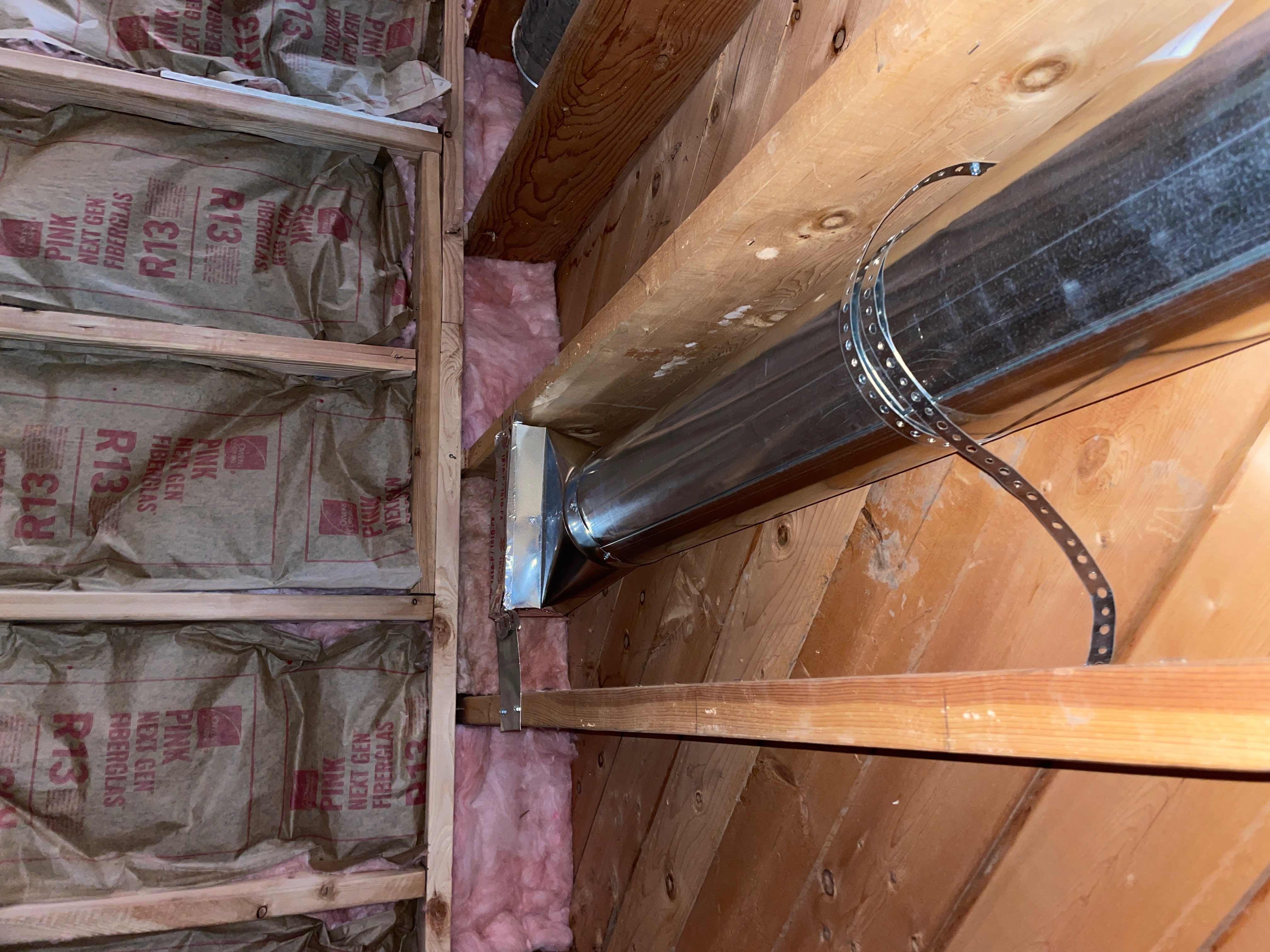 A technician repairs a ductless AC unit, offering an alternative to traditional duct AC systems. Consider a large room air purifier to improve indoor air quality, especially beneficial in spaces without ductwork.