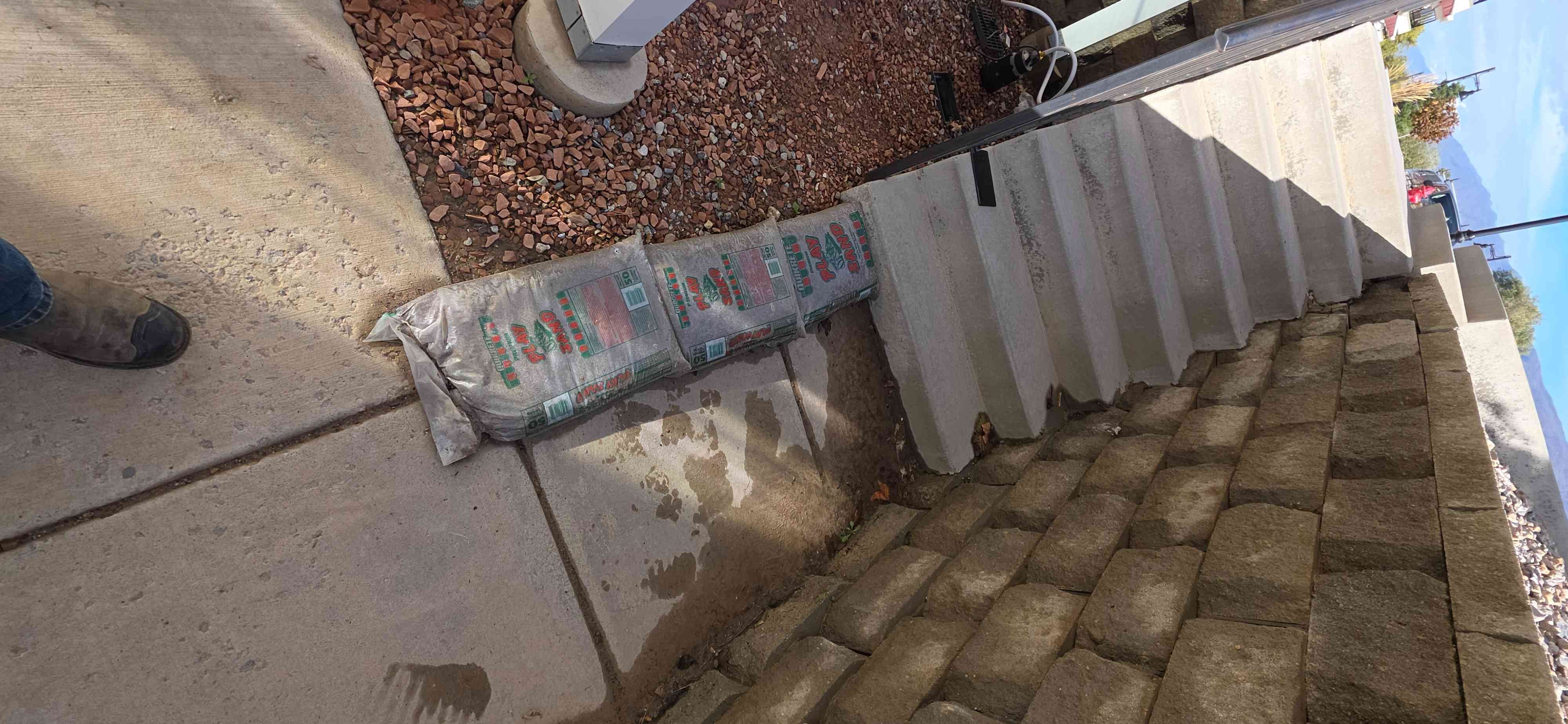 Residential property showing storm damage requiring remediation services. Experts diagnose damage for effective disaster recovery and installation of resilient repairs.