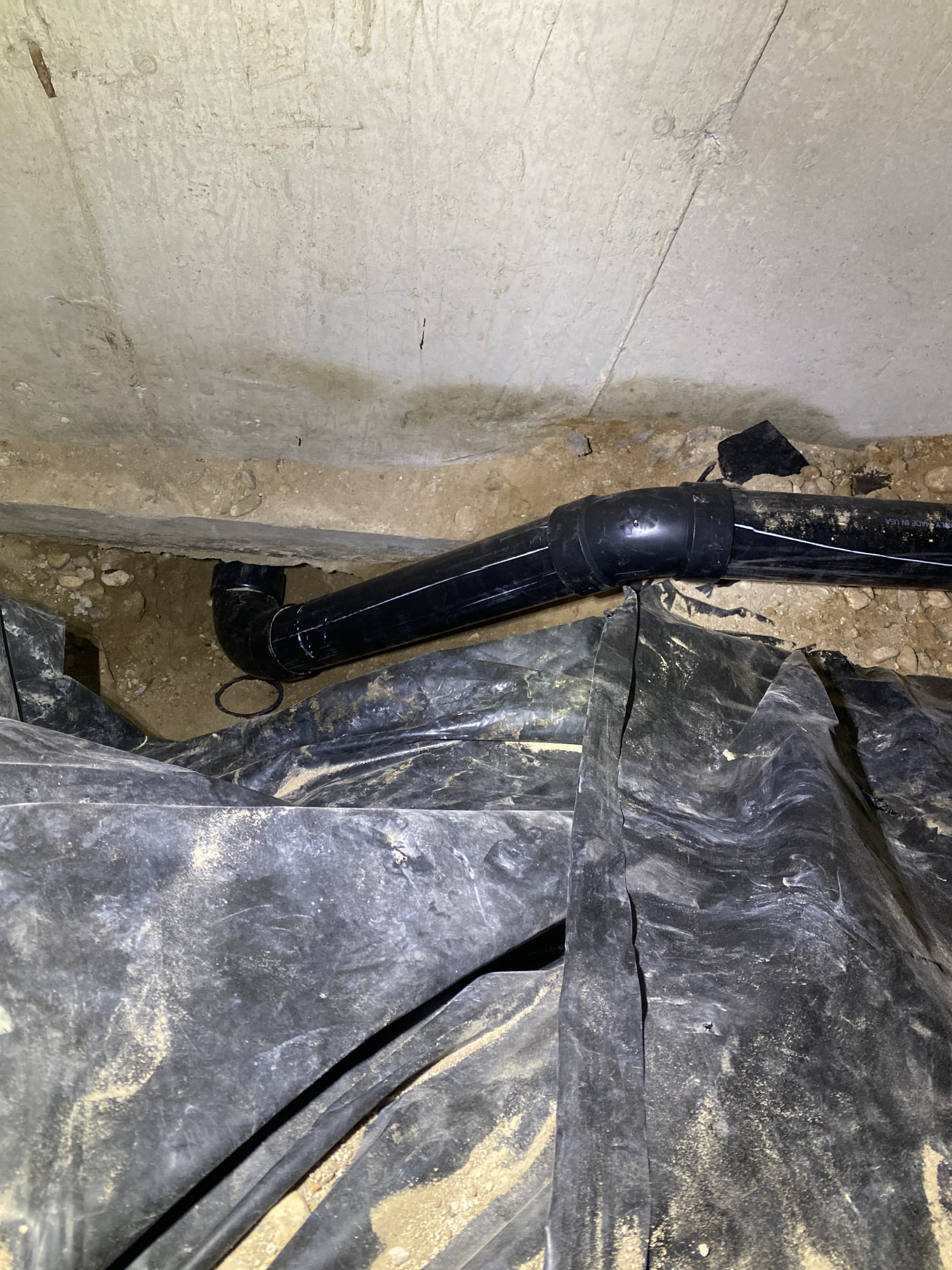 Image depicting tools and solutions for resolving drain issues, including a toilet removal tool and a toilet block remover, suggesting a focus on fixing smelly drain problems related to toilet malfunctions.