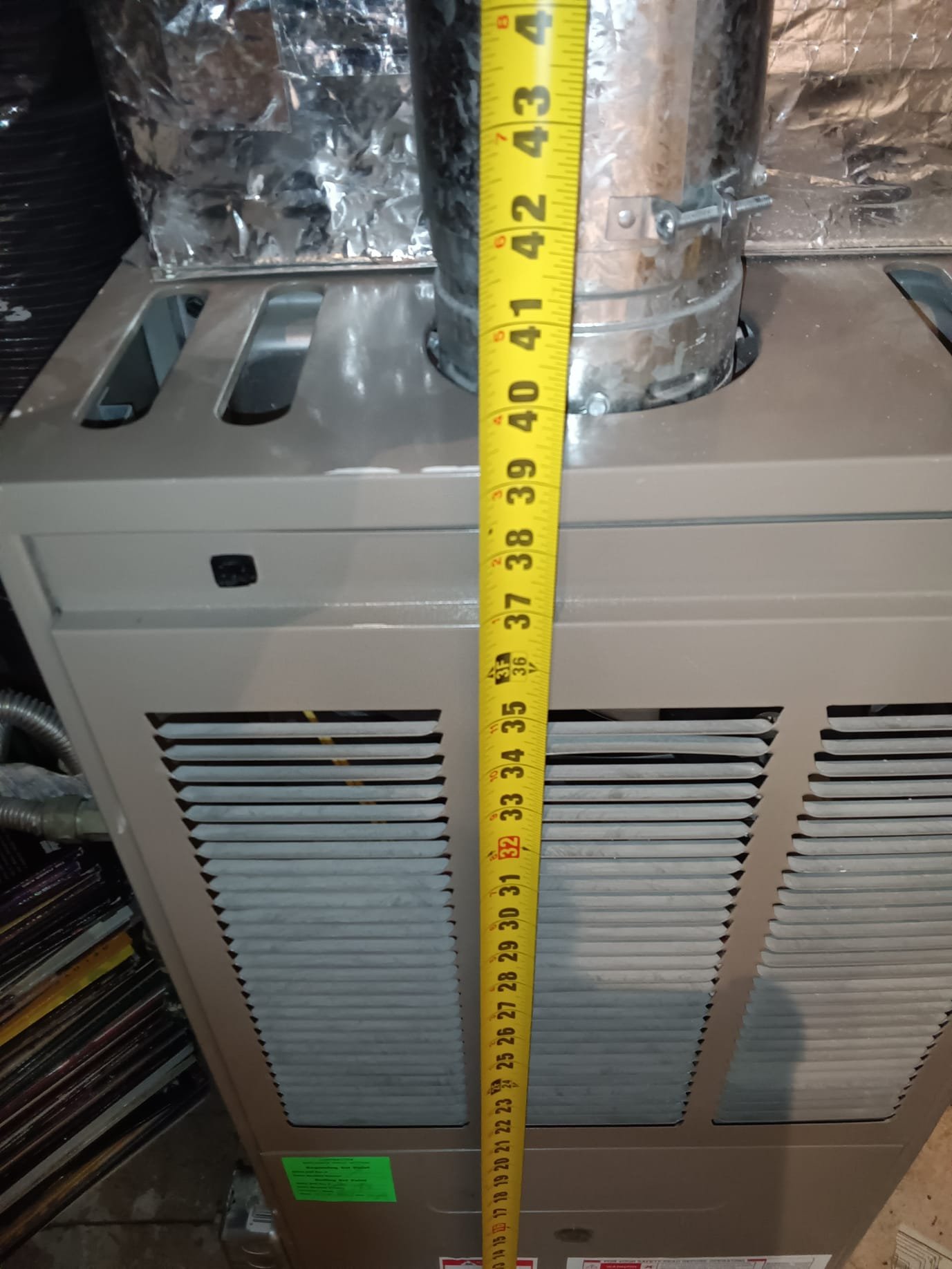 Local HVAC system showcasing both a hydro furnace and a residential electric furnace, providing efficient home heating solutions for modern residential needs.