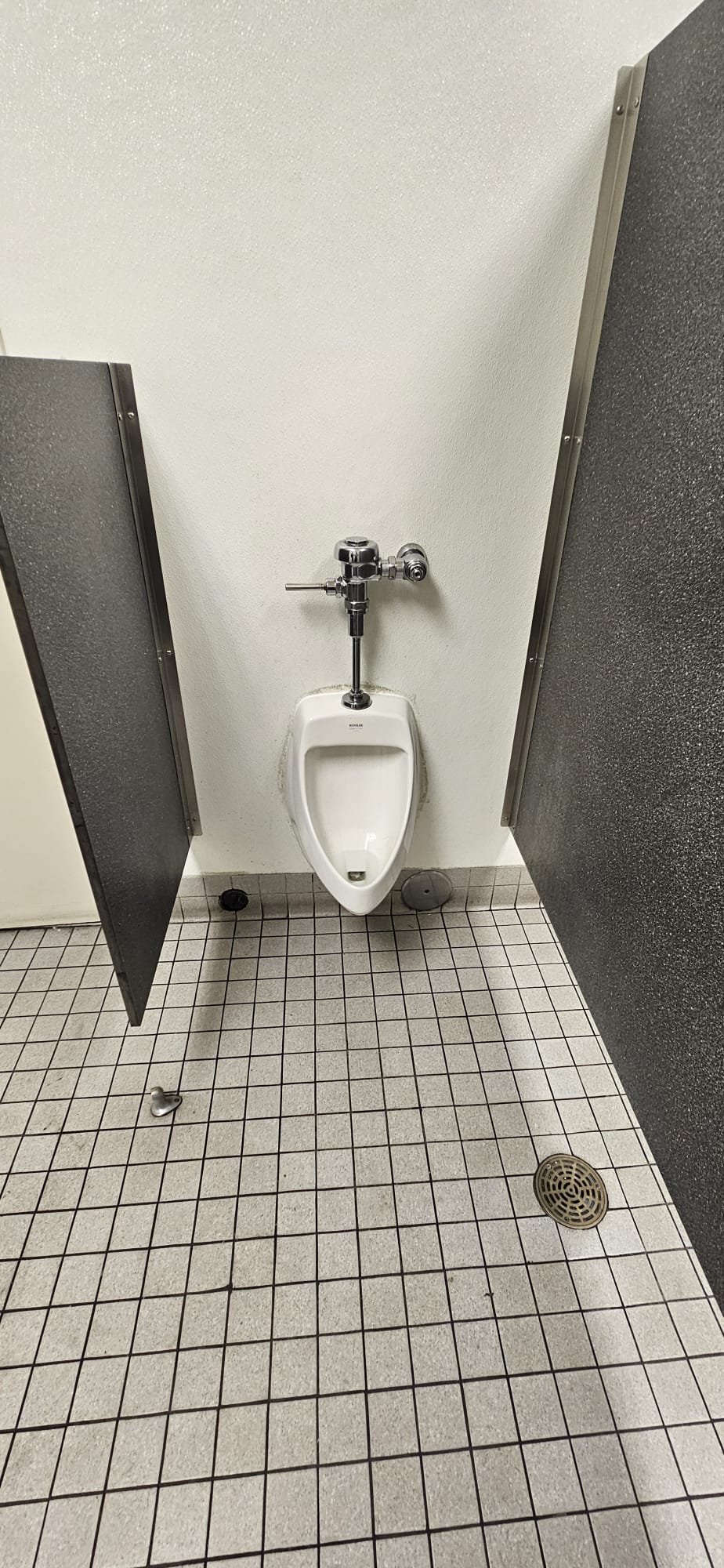 Image of a clean, commercial bathroom in Riverton, Utah, after licensed mold remediation services. We specialize in service and maintenance to prevent future mold growth in commercial bathrooms throughout Riverton and the Salt Lake County area.