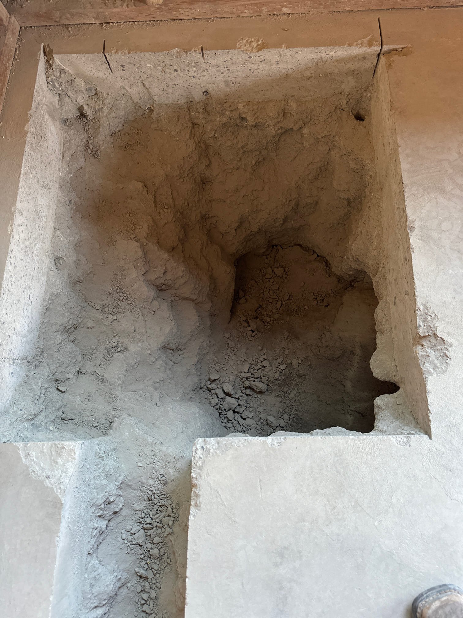 Professional plumber addressing a clogged sink, potentially utilizing a power washer sewer jetter hose for effective drain cleaning. Services may extend to commercial sewer replacement and repair, ensuring comprehensive plumbing solutions.