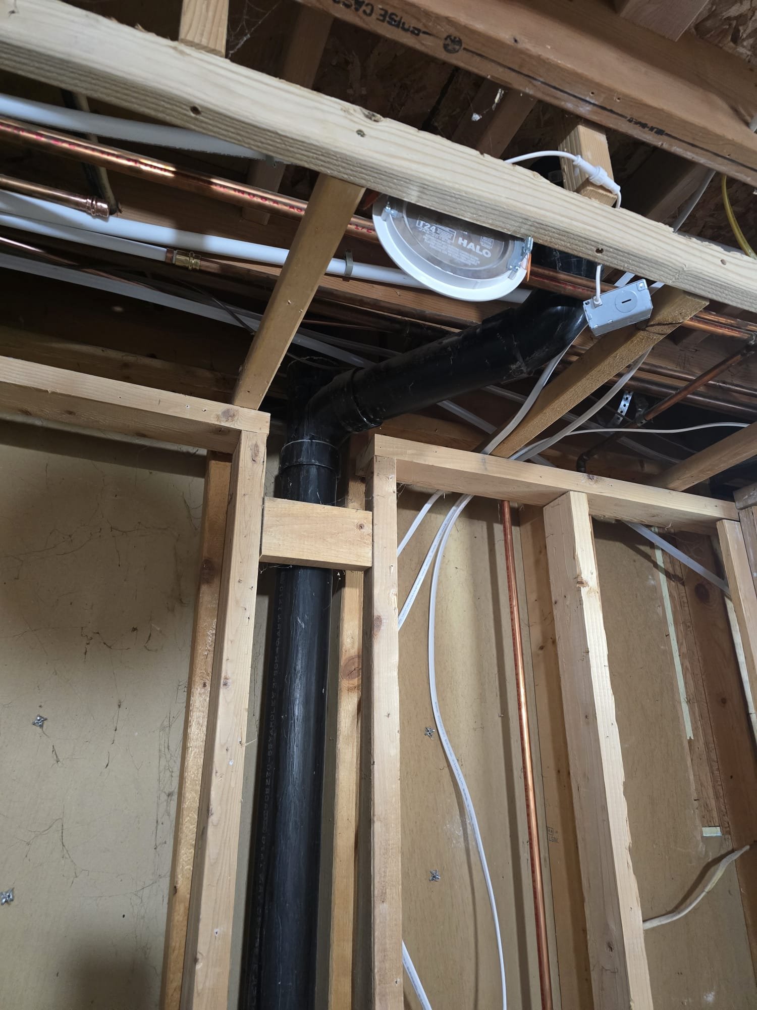 A drainage pipe, essential for channeling water away from structures and landscapes. Often maintained using a drain rooter to clear blockages, it may connect to a French channel drain for efficient surface water management, preventing water damage and promoting healthy soil.