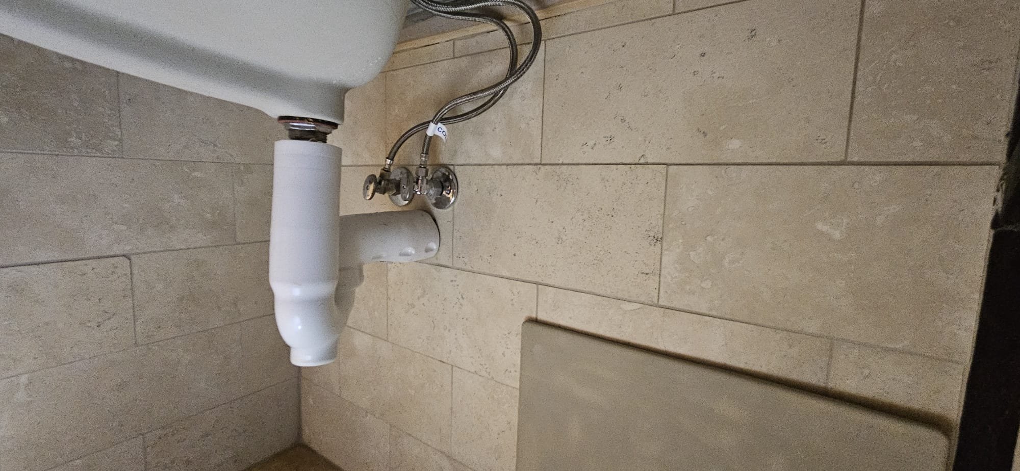 Commercial bathroom with visible mold damage. This image relates to the cost of commercial bathroom mold remediation, the expenses involved in a bathroom remodel to address mold issues, and the importance of professional mold inspection in commercial bathrooms to assess recovery costs.