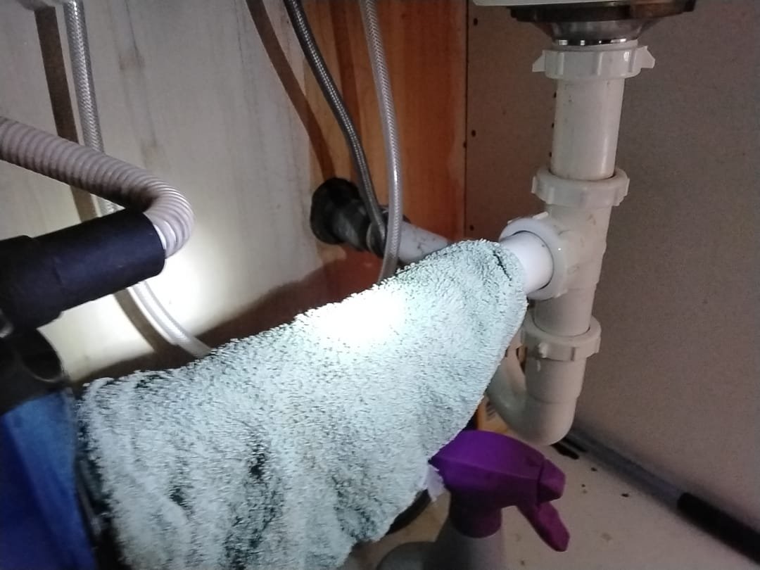 Image depicting basement sewage backup cleaning or troubleshooting, possibly related to septic system issues. Could show the aftermath of septic backing up into a basement, or professional basement sewage backup cleaning in progress, emphasizing the need for expert intervention.