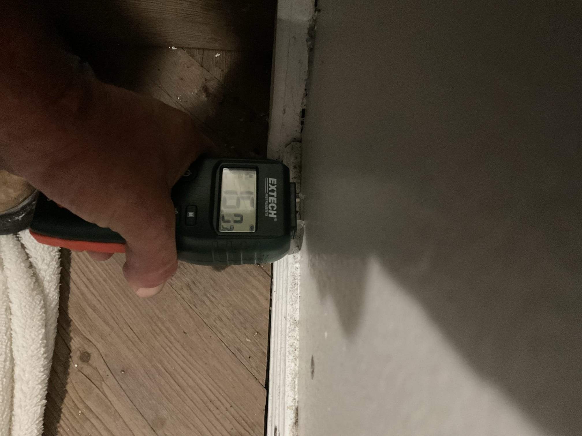 Image depicting the potential connection between water damage (like water behind walls, relevant to water damage insurance claims) and its unexpected impact on hair health, symbolizing the question 'Can water cause hair loss?'