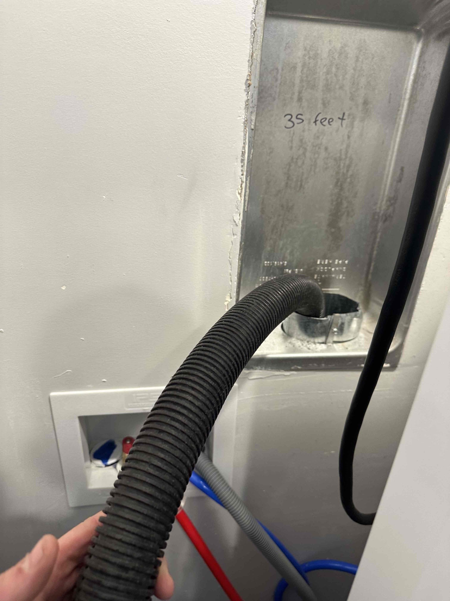 Image illustrating the cleaning process, similar to purifying water with RO filter installation, but for walls. Shows techniques for removing soot (like nicotine stains) from painted walls, restoring cleanliness. A clean home is like clean water - essential!