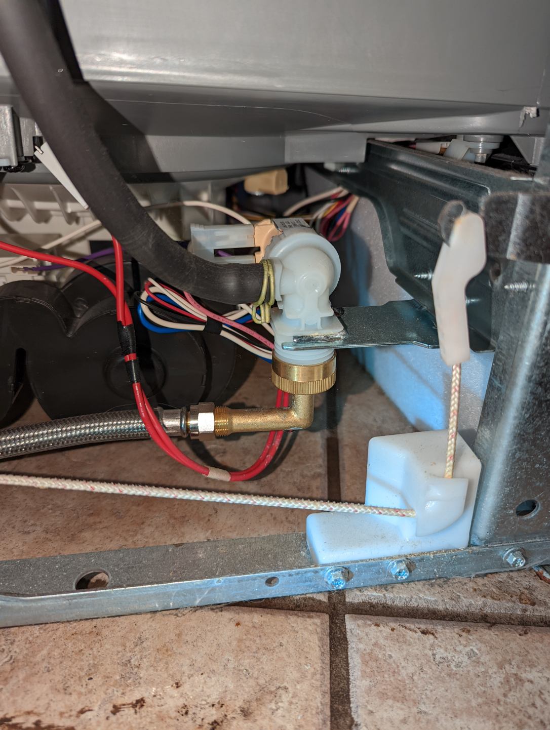 Image related to disaster mitigation and restoration services, possibly showing a flooded kitchen or a technician working on plumbing. Could also depict a helpful guide on how to reset a sink disposal, connecting home maintenance with professional disaster preparedness and restoration.