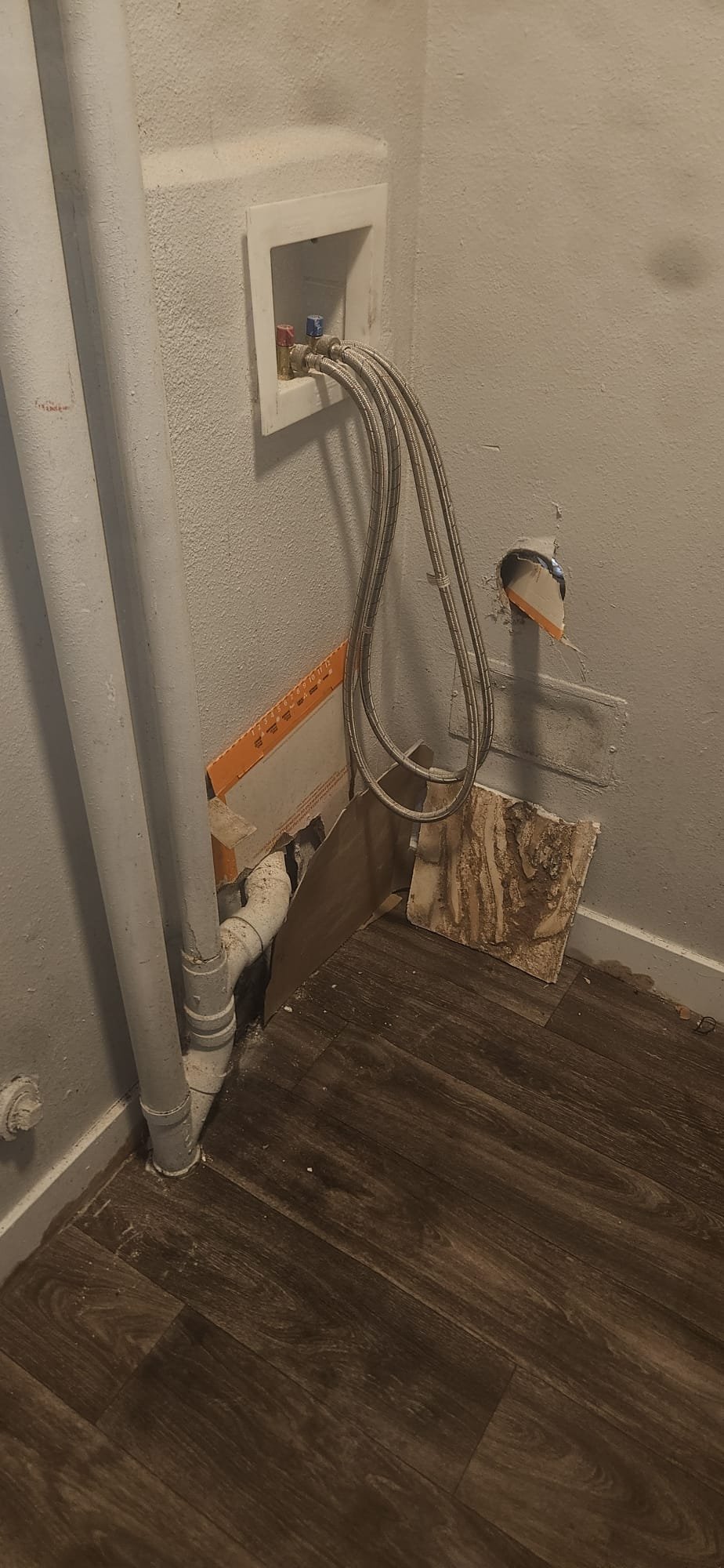 Close-up of a drain clean out, a crucial access point for clearing clogged drains. Illustrates the concept of 'how to snake a drain' using tools like drain augers to remove obstructions and restore proper flow.