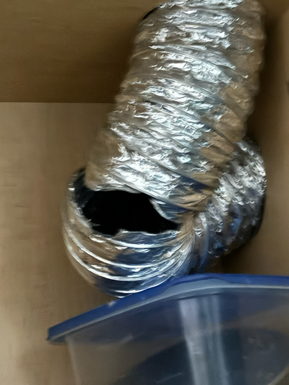 South Jordan, Utah: Image of commercial smoke cleanup equipment near a restaurant. Reflects emergency commercial smoke damage restoration and the importance of regular restaurant grease trap cleaning services to prevent fires and smoke damage.