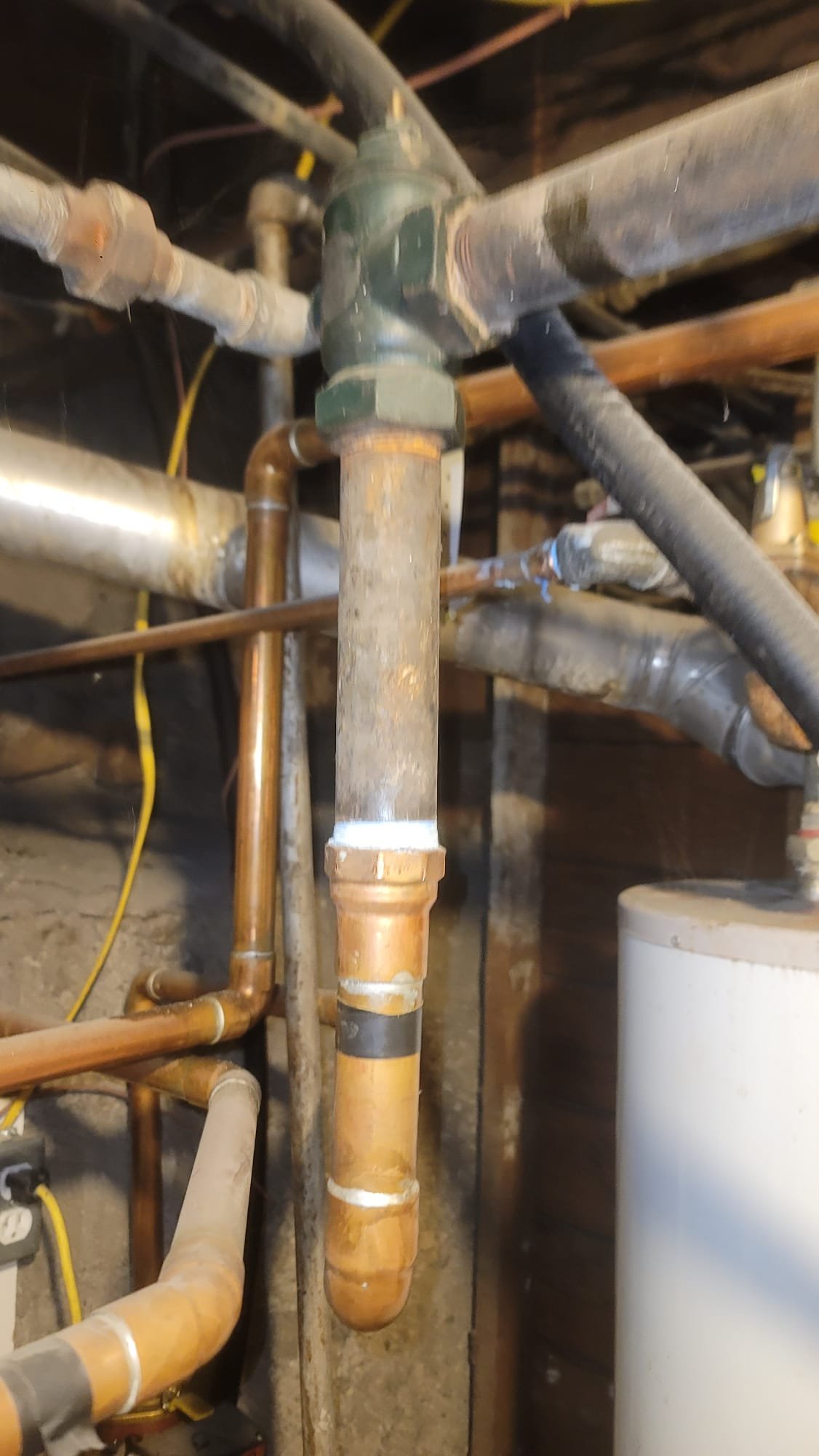 Image depicting a professional boiler installation, showcasing a modern heating boiler unit connected to a hot water heater system. Emphasizes the availability of local boiler installation services.