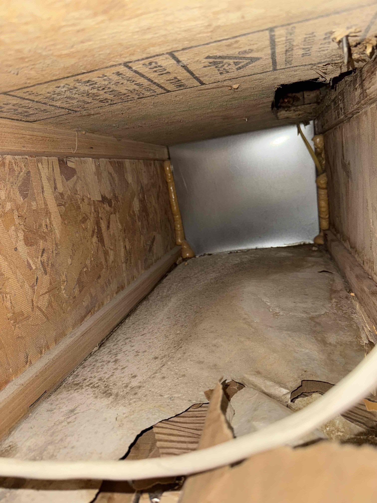 Image depicting after-hours commercial sewage backup restoration in progress. Technicians are addressing a sewage emergency, highlighting the importance of commercial backflow testing to prevent future incidents. This scene emphasizes the need for 24-hour commercial sewage backup restoration services for businesses facing unexpected plumbing disasters.