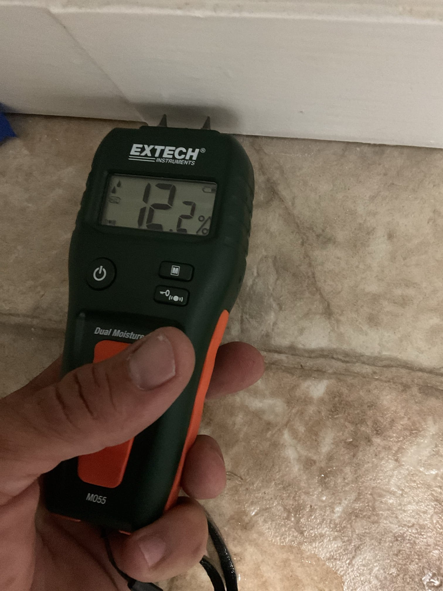 Image depicting a water technician assessing commercial water damage. Ideal for a water damage company providing local services.