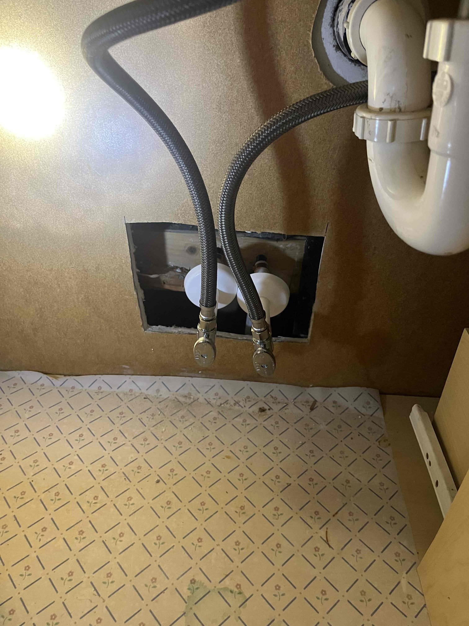 Residential ceiling showing water damage, a reminder of potential plumbing issues. Consider affordable ceiling water damage maintenance and the importance of residential well water purification systems to prevent future problems and ensure clean water throughout your home.