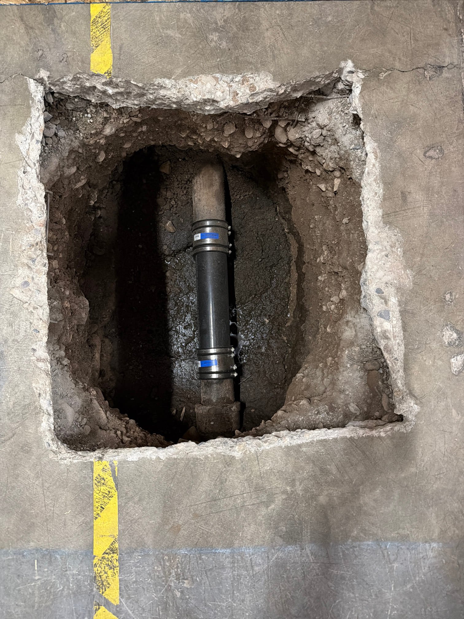 Image depicting hydro jetting, a powerful sewer cleaning method. High-pressure water jets blast away stubborn clogs and buildup in sewer lines, a service often searched for as 'hydro jetting cost near me' or 'hydro jetting sewer line near me'. This effective alternative to traditional snaking ensures a thoroughly cleaned pipe.