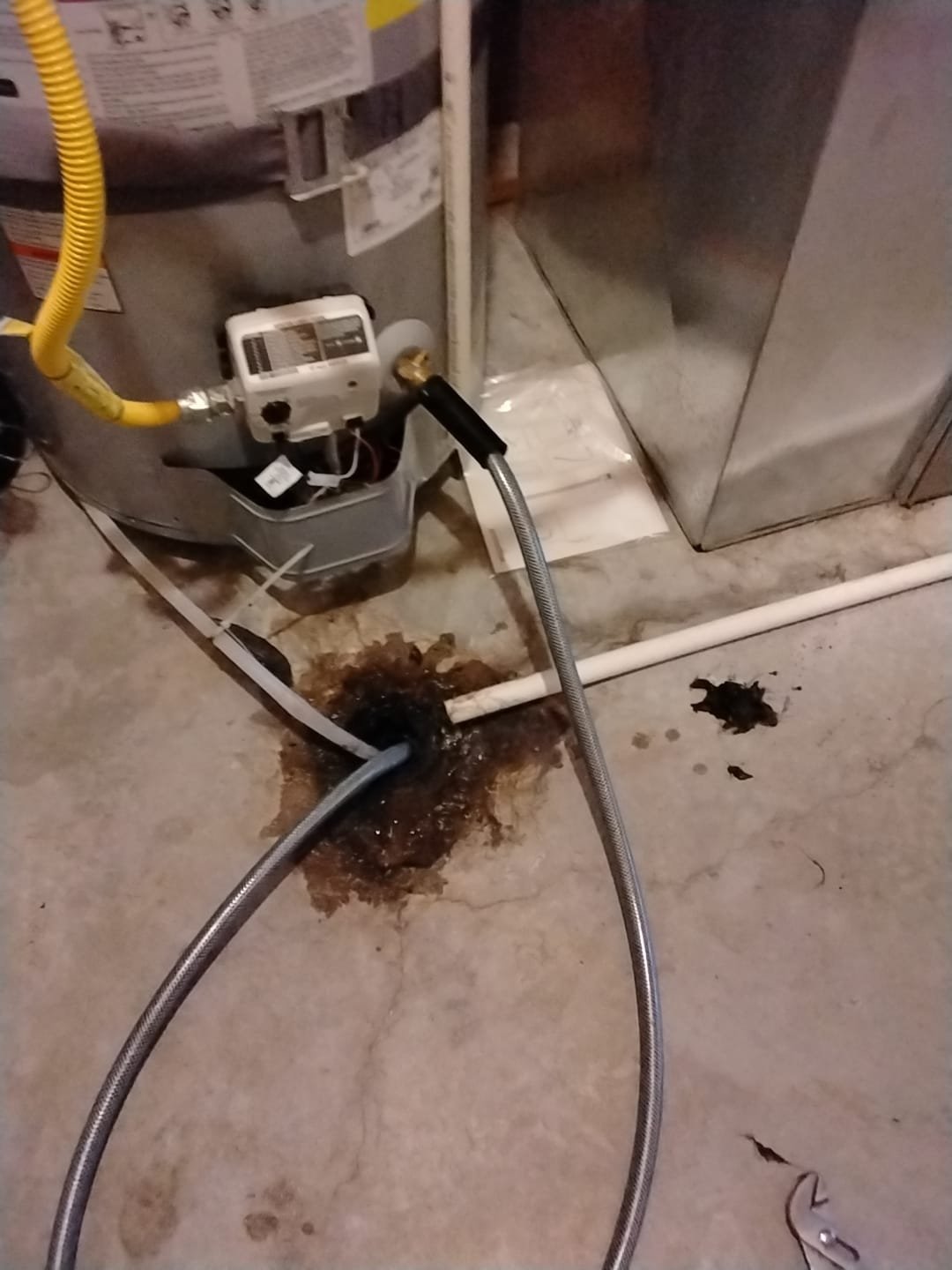 Image depicting the importance of regular maintenance, similar to grease trap cleaning and commercial fire cleaning repair, highlighting a clothes dryer cleaning service removing lint buildup to prevent fire hazards and improve efficiency.