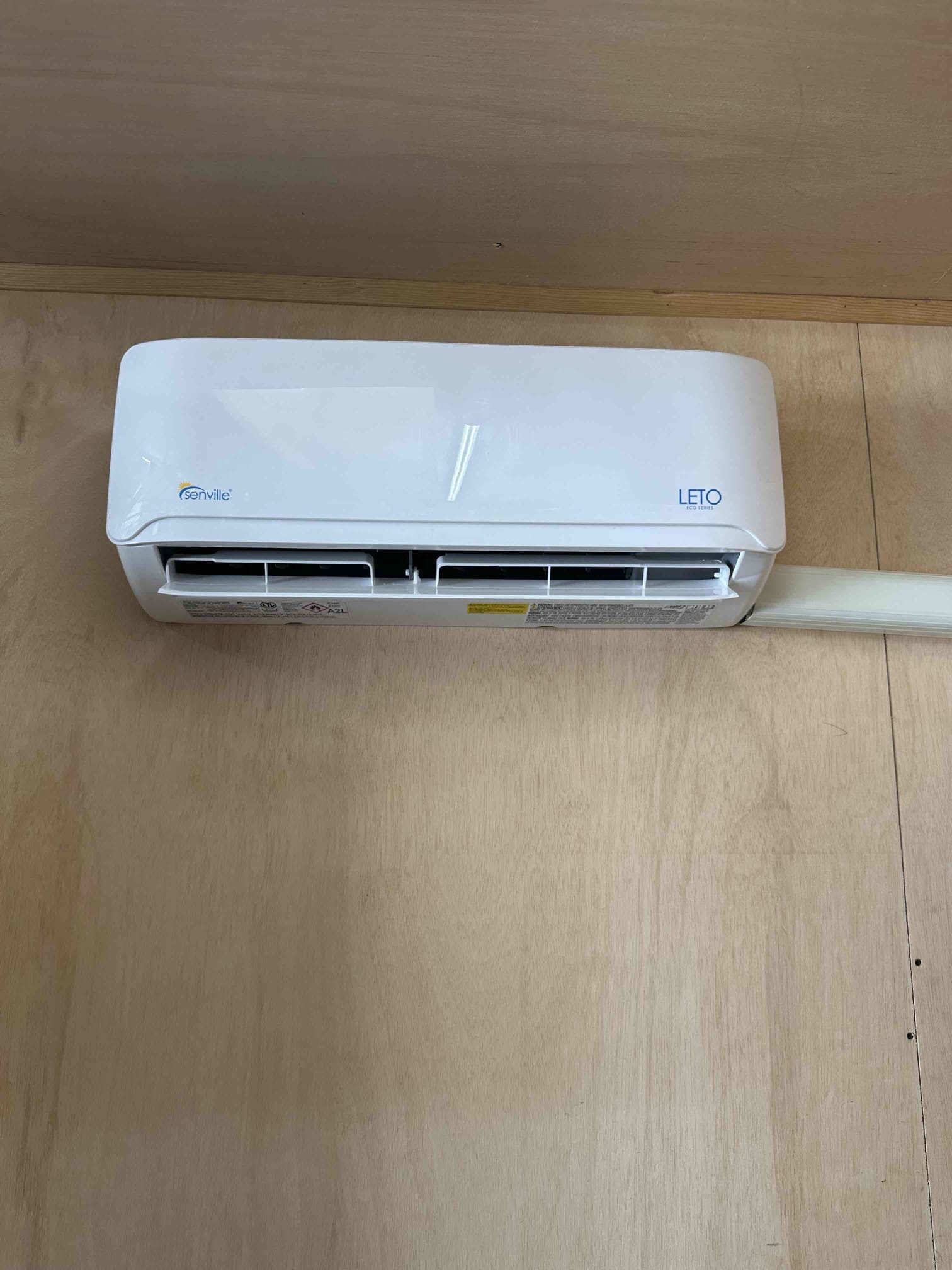 Image depicting central air installation, relevant to central air installation price and how much to get central air installed. Focus on the process and equipment involved.