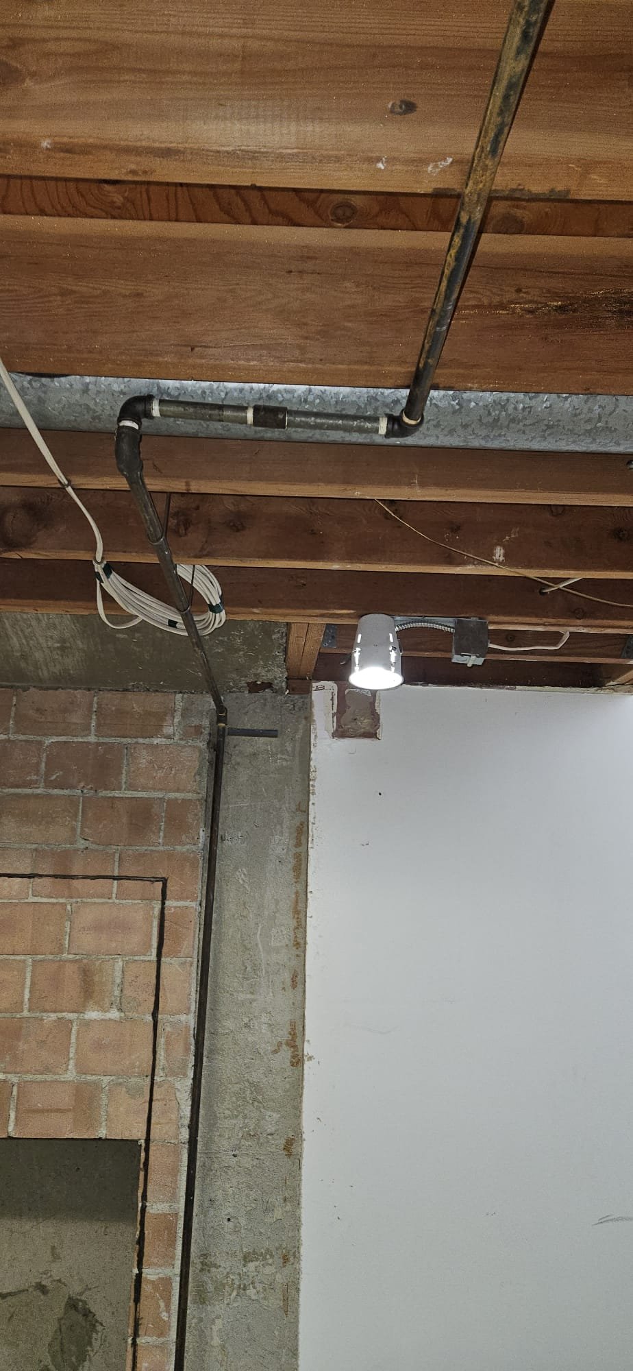 Image of a commercial building undergoing professional and affordable mold remediation. Technicians are shown safely removing mold and repairing water damage, highlighting effective commercial mold recovery repair services.