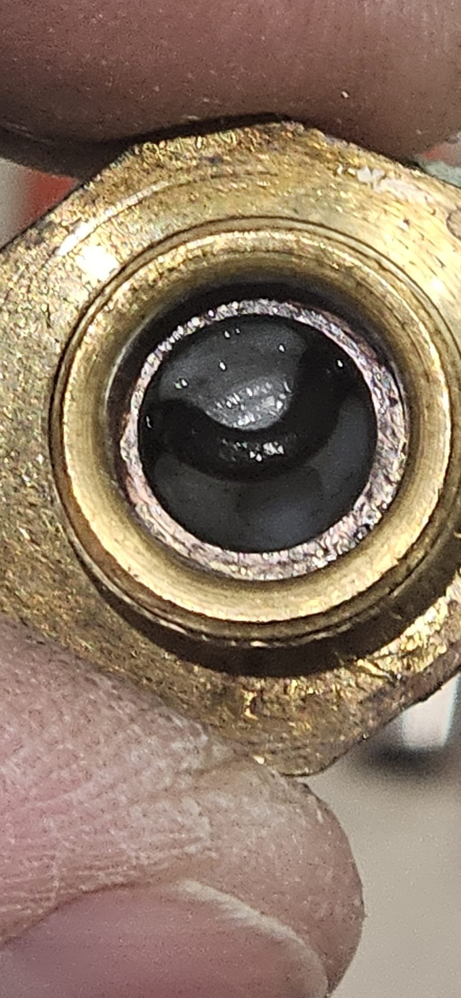 Close-up of water flowing from a Pfister Pasadena faucet into a sink. The sleek design highlights the faucet's functionality, reminiscent of a parts of a faucet diagram, showcasing its efficient water flow and modern aesthetic. Ideal for showcasing plumbing fixtures and bathroom design.