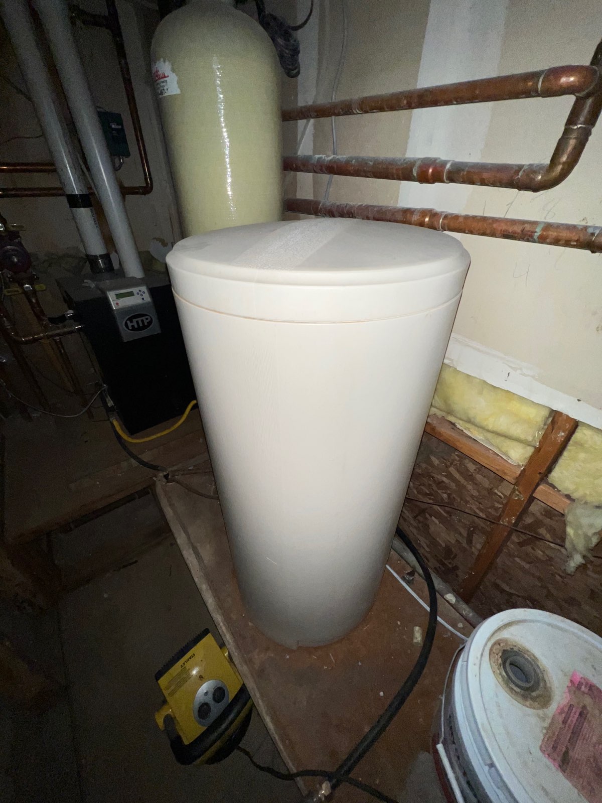 Close-up of a tub snake tool, commonly used for clearing clogged drains and resolving toilet bowl problems. An essential tool for toilet tune-ups and plumbing maintenance.