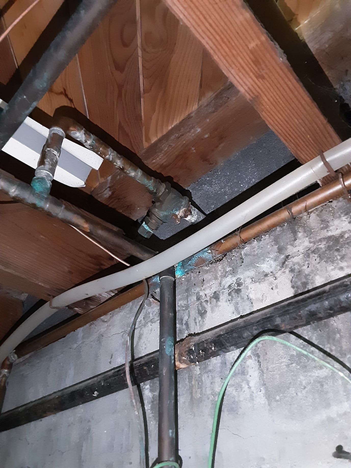 Image depicting home water conditioning equipment, subtly implying its connection to preventing water quality issues that, if left unaddressed, could lead to larger-scale problems requiring professional commercial water damage odor removal services, similar to the odor control challenges faced by wastewater treatment plants (WWTP).