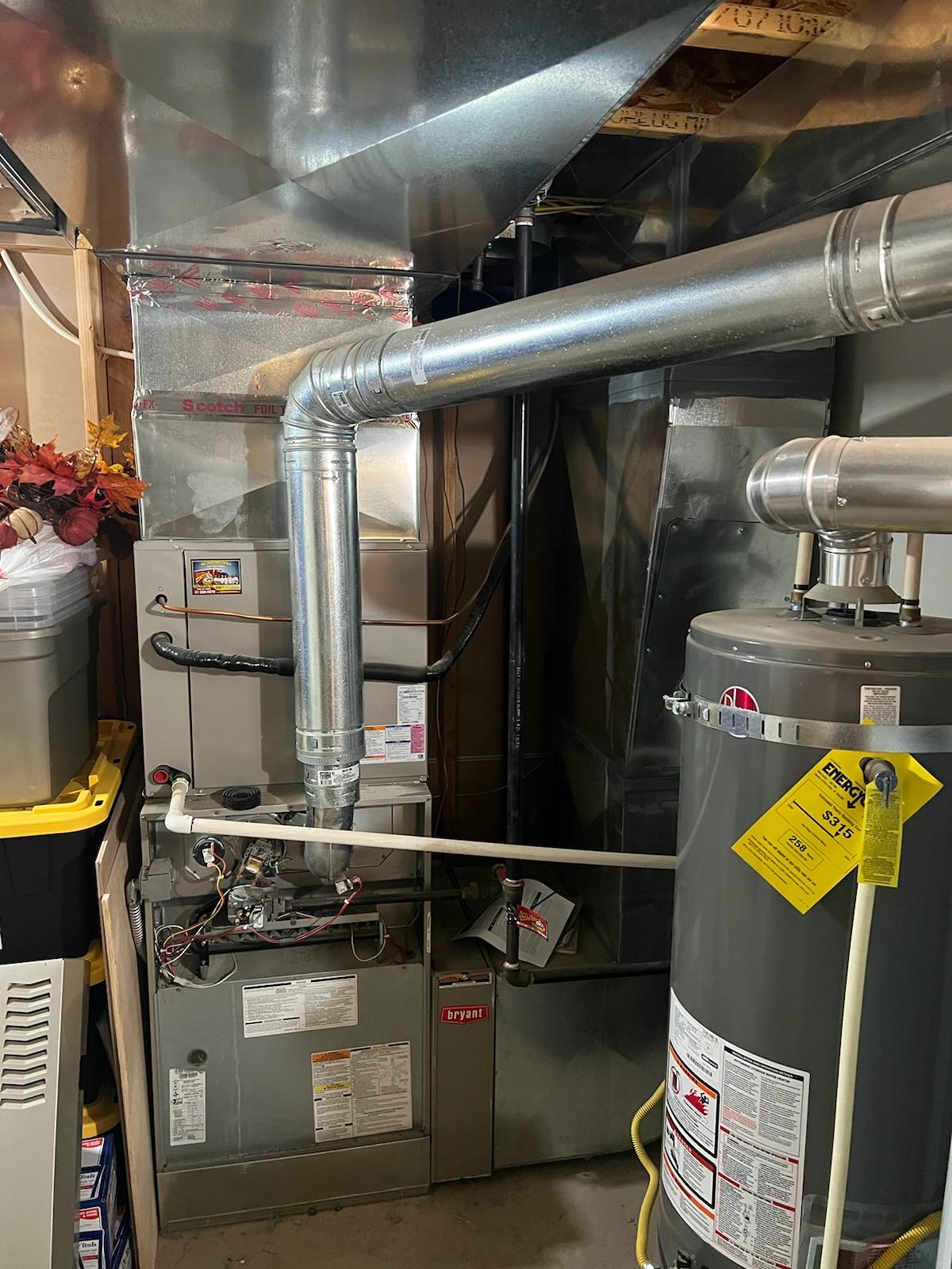 Image depicting emergency furnace repair services. Could show a technician working on a Heil furnace, emphasizing 24/7 availability for local furnace repair needs.