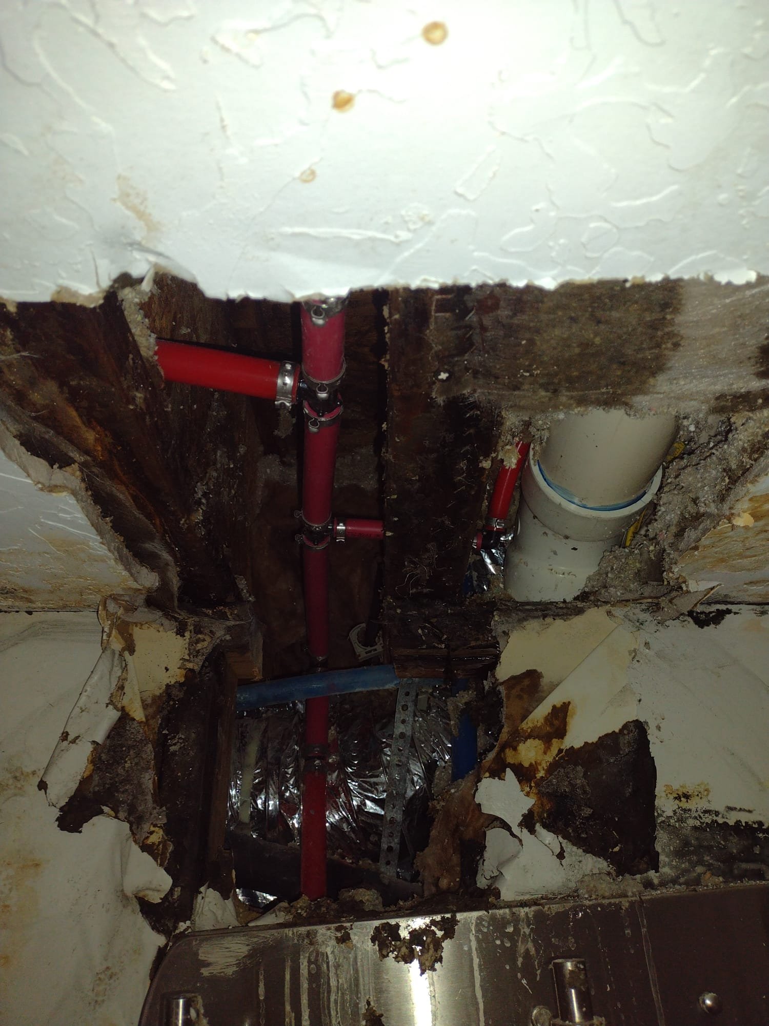 Image depicting the importance of dryer vent maintenance to prevent water damage. Call a professional for dryer vent repair to avoid moisture buildup that can lead to drywall water damage and costly drywall repair. Protect your home from water damage; schedule regular dryer vent cleaning and address any water damage repair needs promptly.