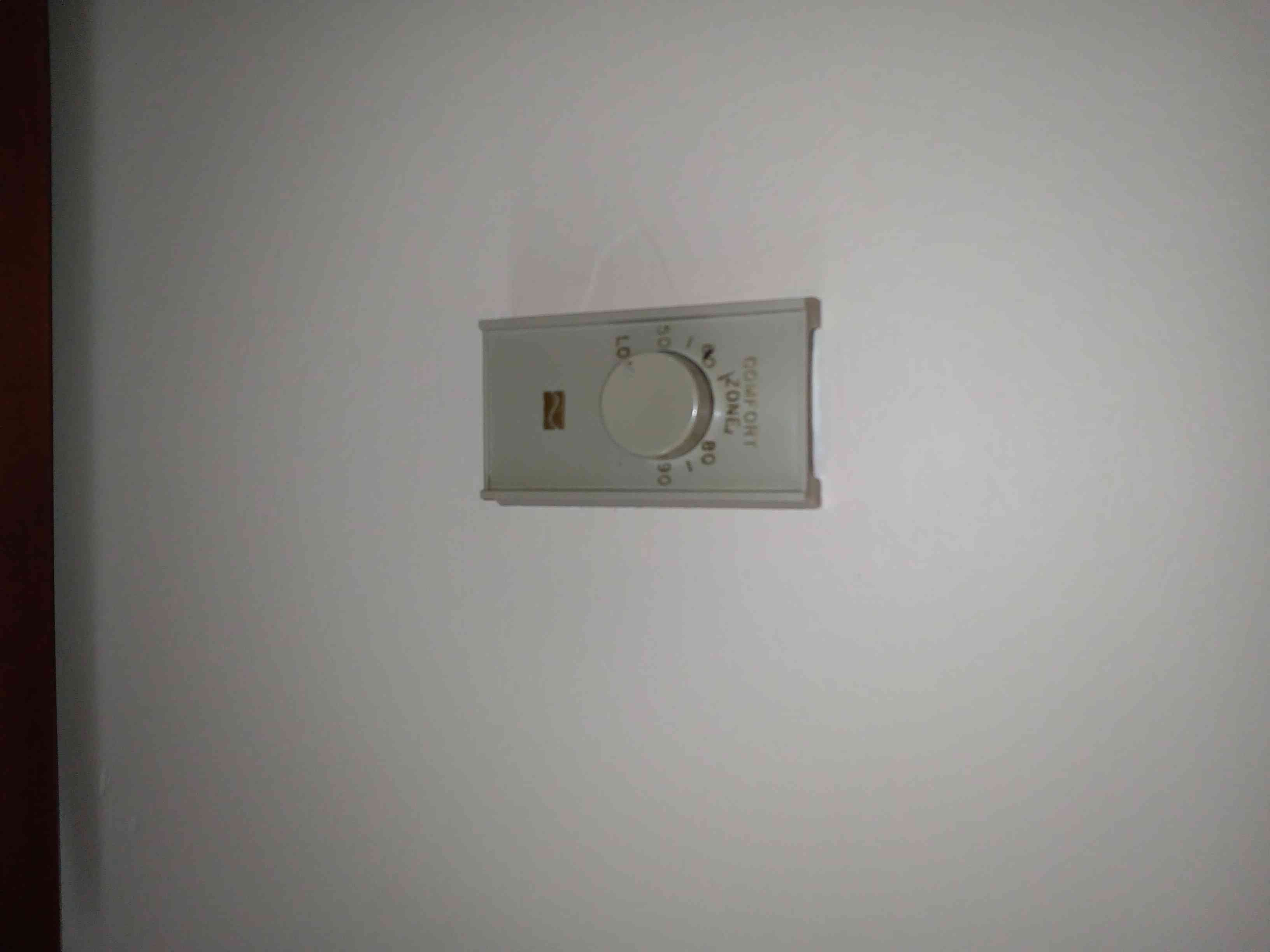 High voltage smart thermostat, ideal for shop thermostats and 2-wire programmable thermostat replacements, offering energy-efficient temperature control.