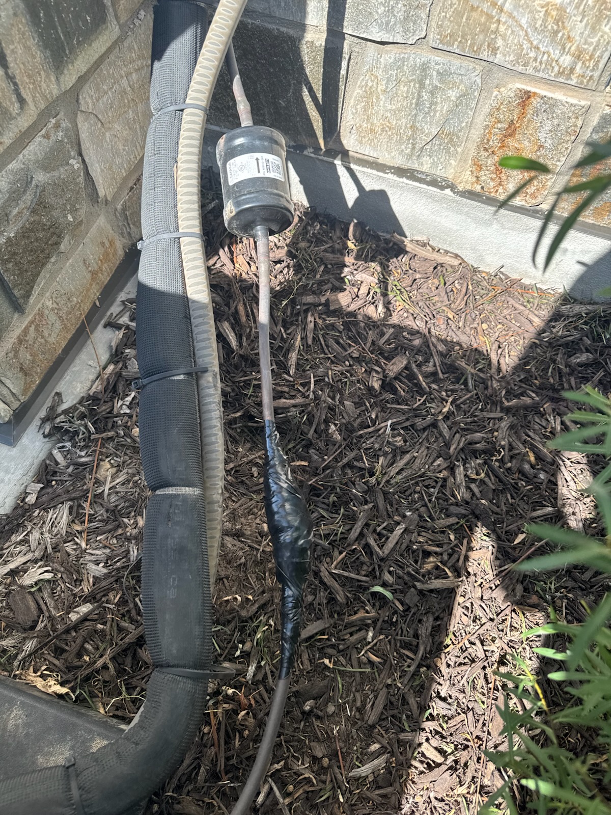 Commercial HVAC unit undergoing preventative maintenance. Regular commercial HVAC maintenance services help control commercial HVAC maintenance costs and ensure efficient operation.