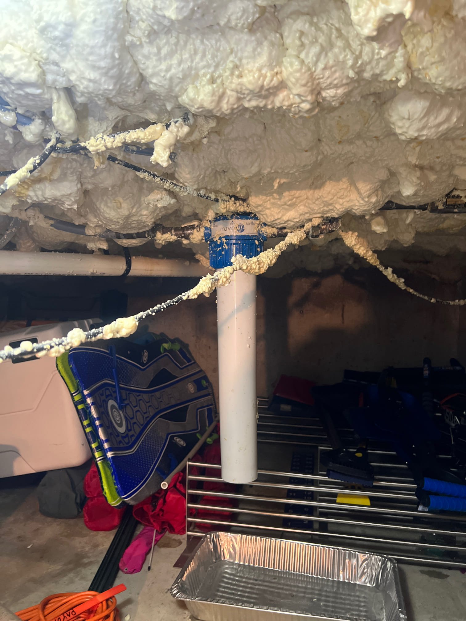 A malfunctioning gas water heater, the likely culprit behind your cold showers. Thinking 'how much is a new water heater?' This image represents the frustration of a broken water heater and the potential expense of replacement.