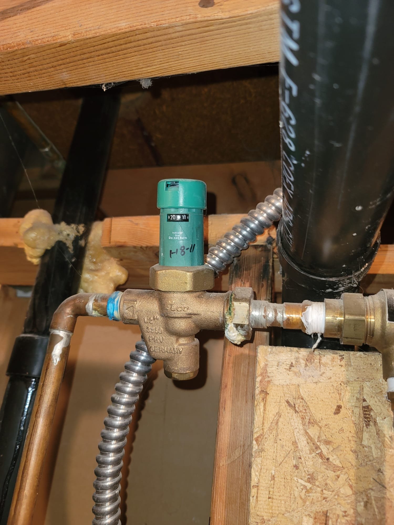 Image related to local heating and cooling repair services. Could depict a technician working on a furnace, HVAC unit, or other heating system. Represents finding 'heating system repairs near me' and 'heating repair services near me'.