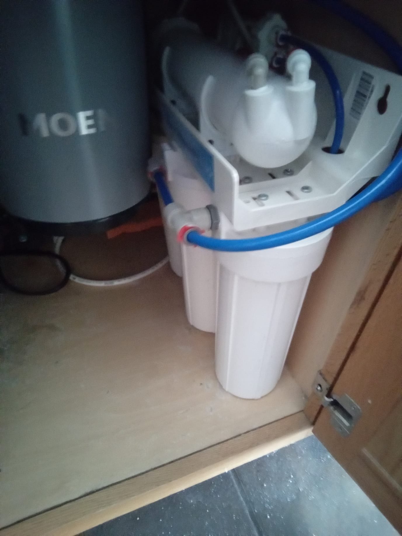 Image of basement drywall undergoing water damage remediation. Shows the process of maintenance, inspection, and installation to repair and prevent further damage. Focuses on restoring the drywall and protecting the basement from future water intrusion.