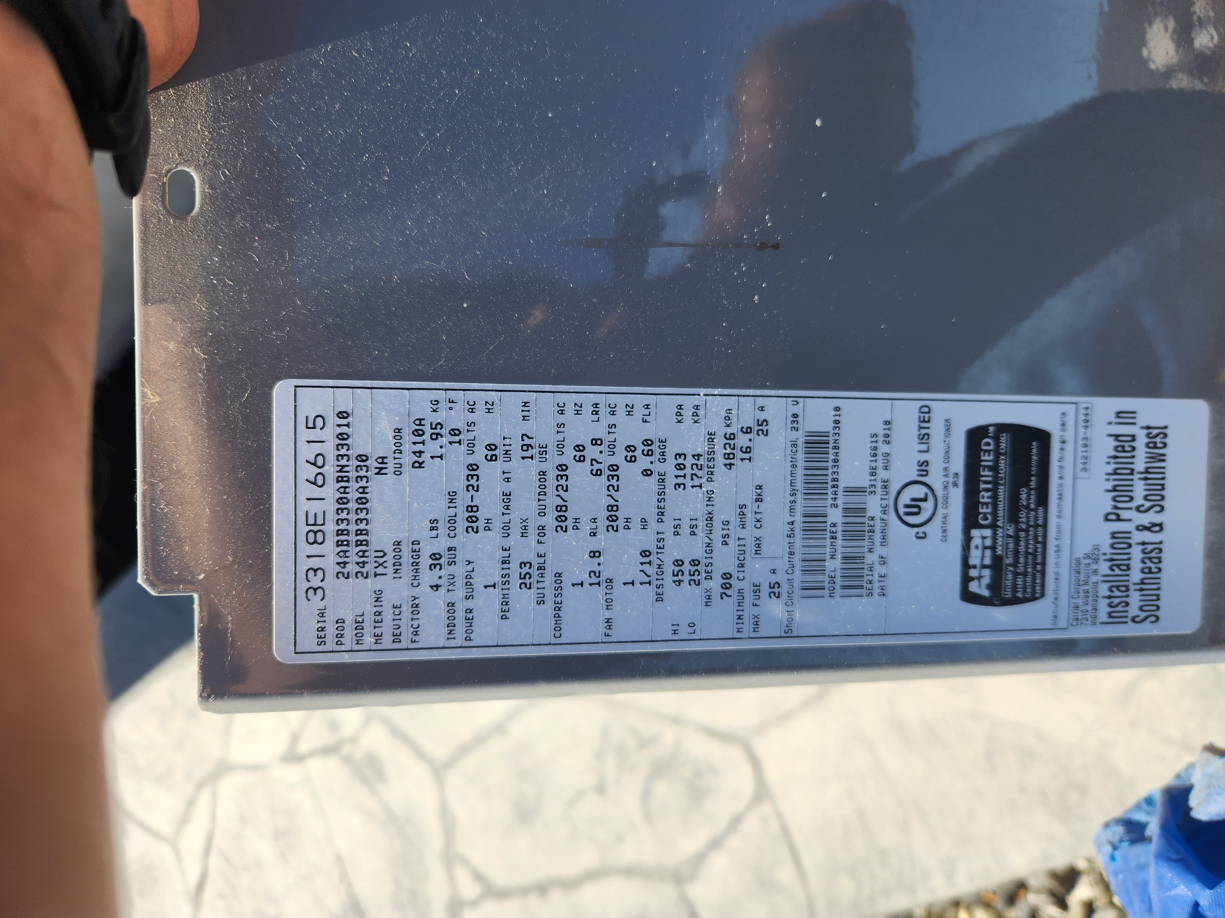 Image related to commercial HVAC replacement, likely showing a Trane heat exchanger being replaced. Could be related to the price of heat pump components or the overall cost of HVAC system repair.