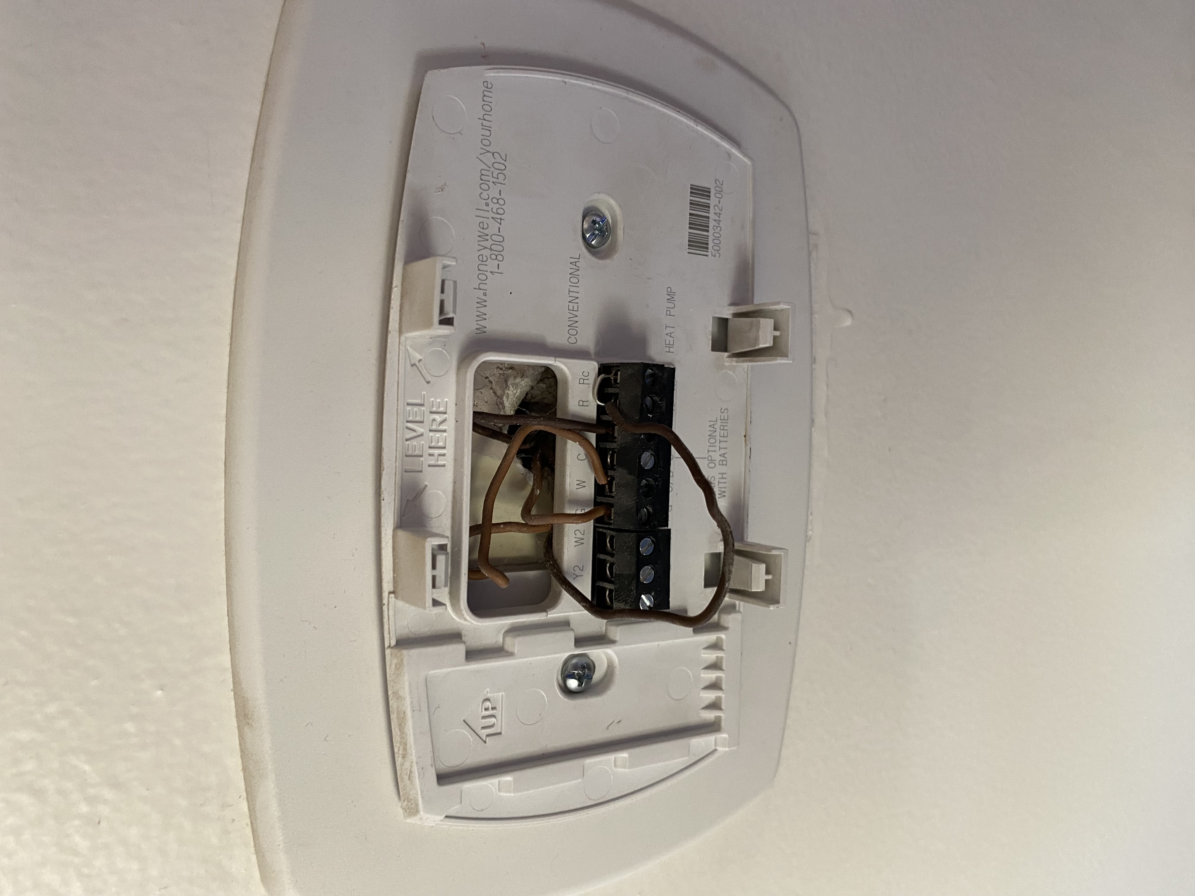 Inside view of a home air conditioning unit, highlighting key components. Essential for understanding AC repair and the importance of professional air conditioning install near me for efficient home cooling.