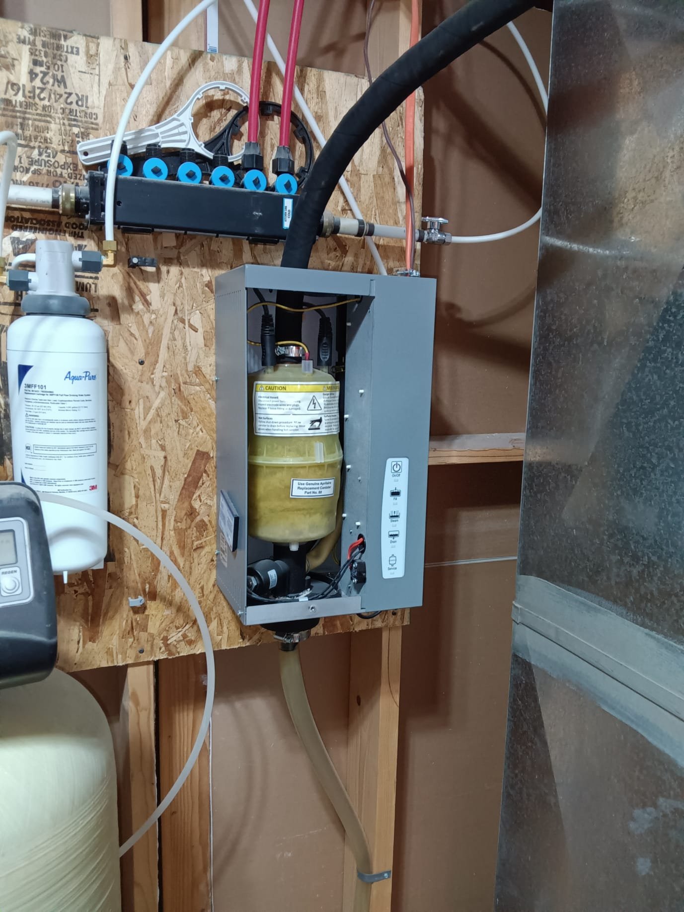 Close-up of water softener resin beads, the key component in household water softeners that helps prevent hard water issues and potential insured residential drywall water damage remediation costs.