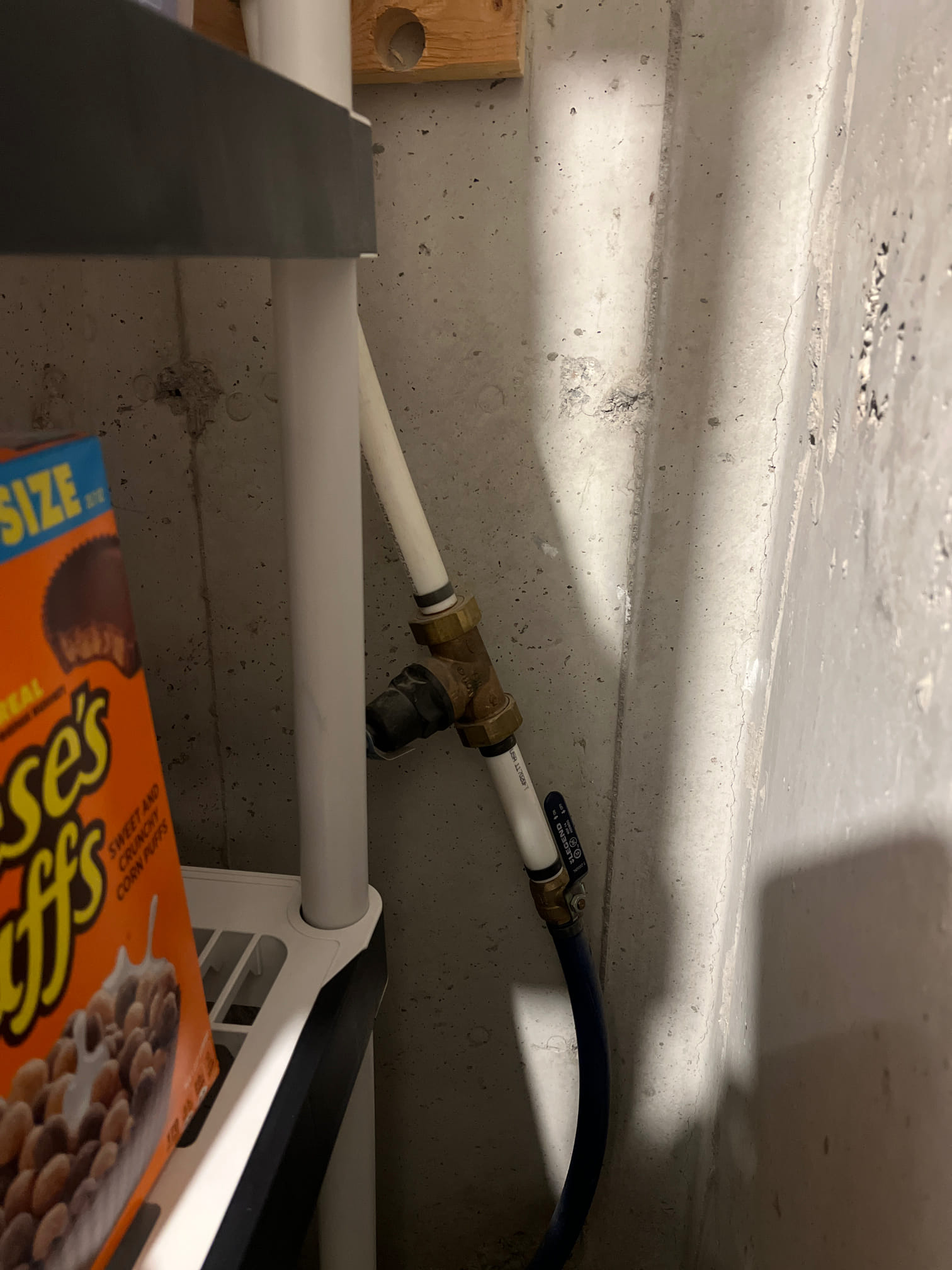 Image of cleaning mould from a bathroom ceiling. Removing mould helps eliminate bathroom odor. Addressing issues like mould are important considerations when planning a bathroom remodel, impacting the average cost.