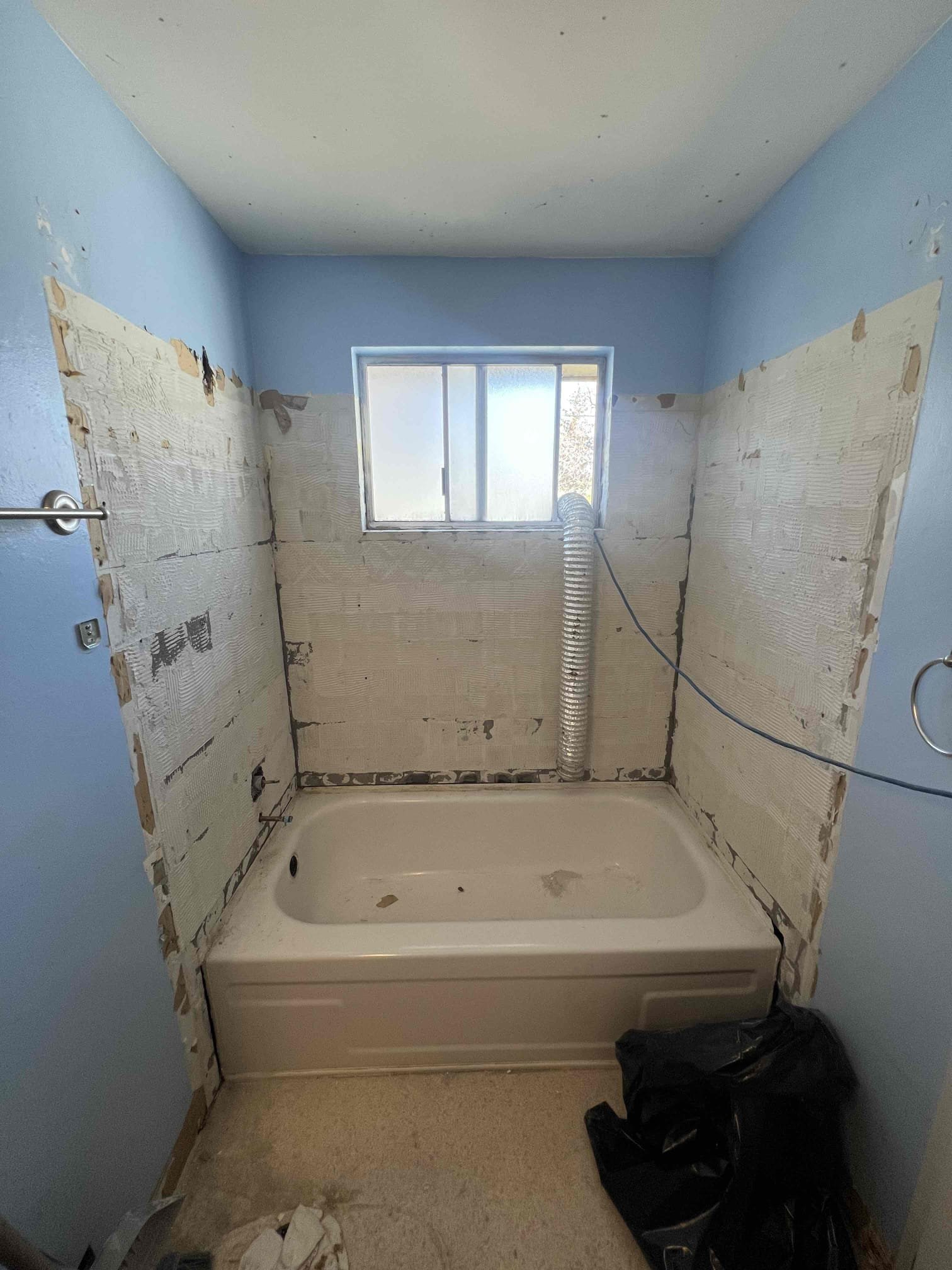 Image depicting ceiling water damage, possibly with pink mold, highlighting the need for professional ceiling water damage repair experts to address the issue and associated costs.