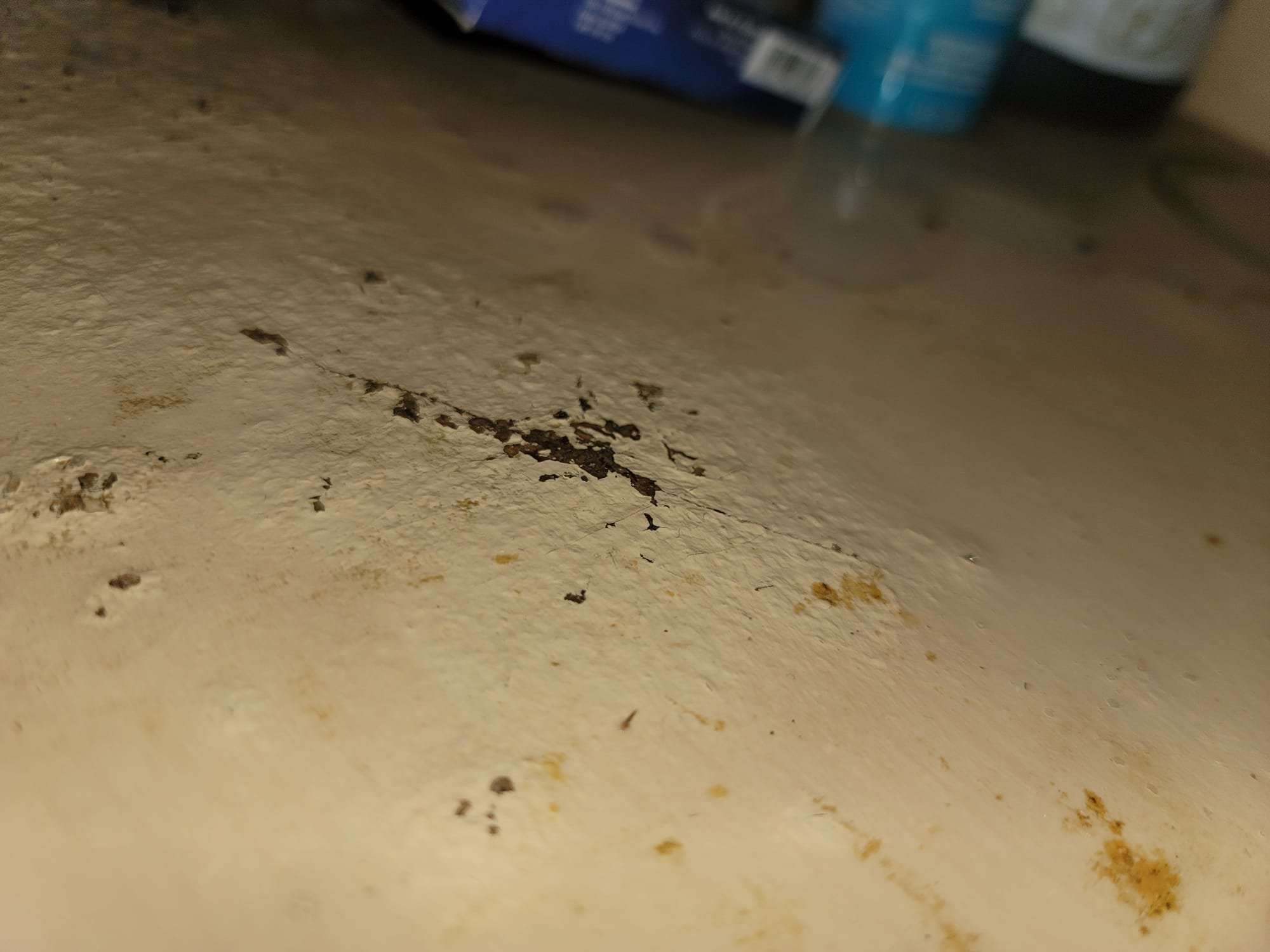 Image depicting signs indicating the need for smoke remediation services, such as soot accumulation, lingering smoky odors, and respiratory issues. Focus on smoke remediation repair and restoration.